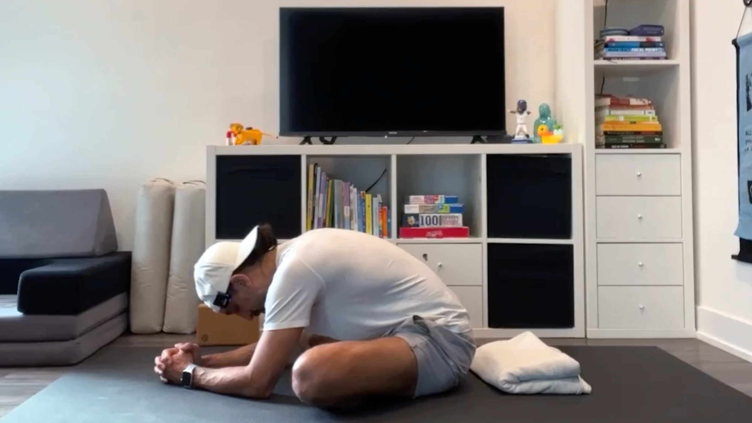 Yoga teacher Jaafar Hussain at Seated Forward Bend, part of his yoga training for the hips