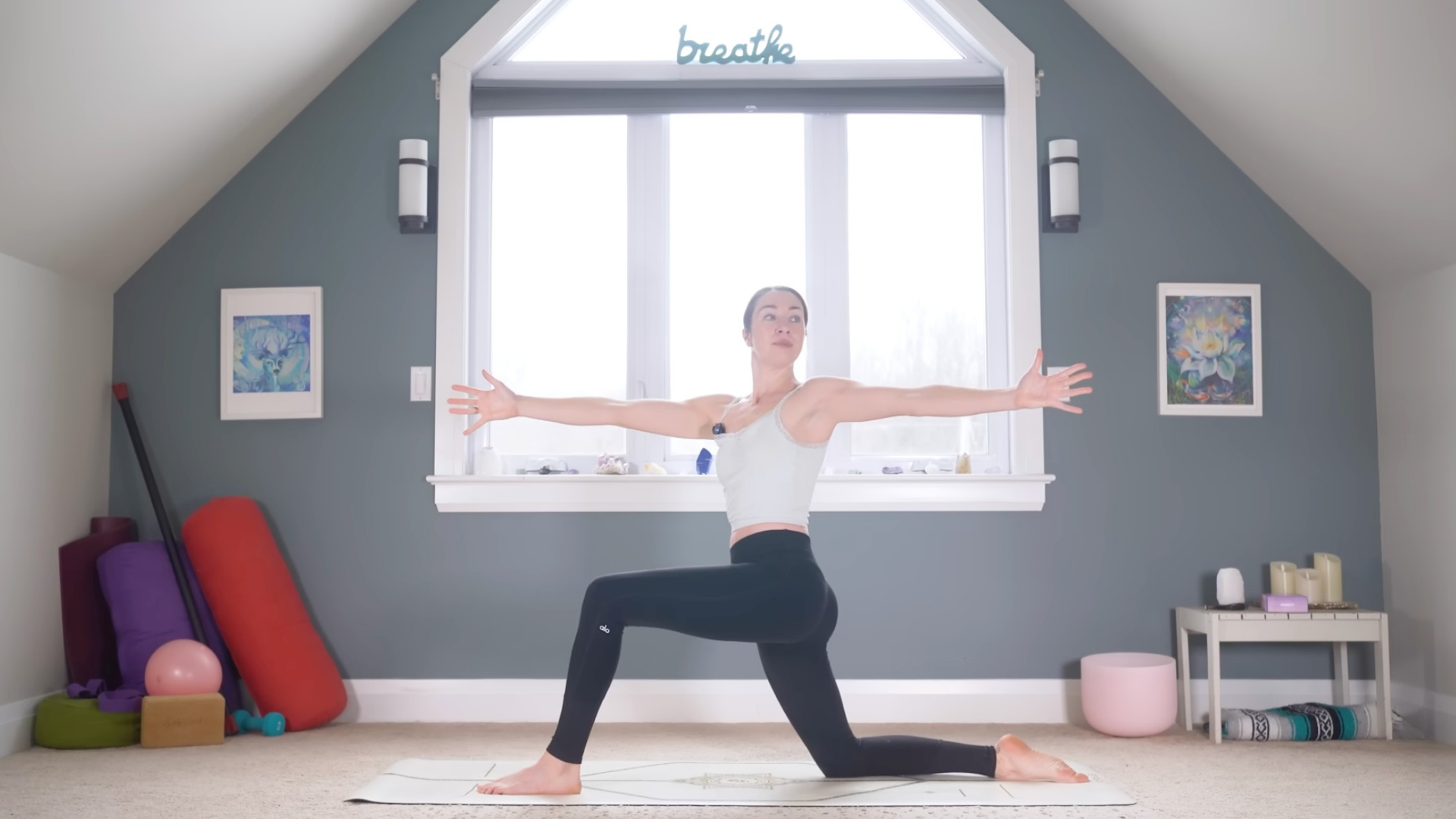 Woman twisting toward the left in a Low Lunge