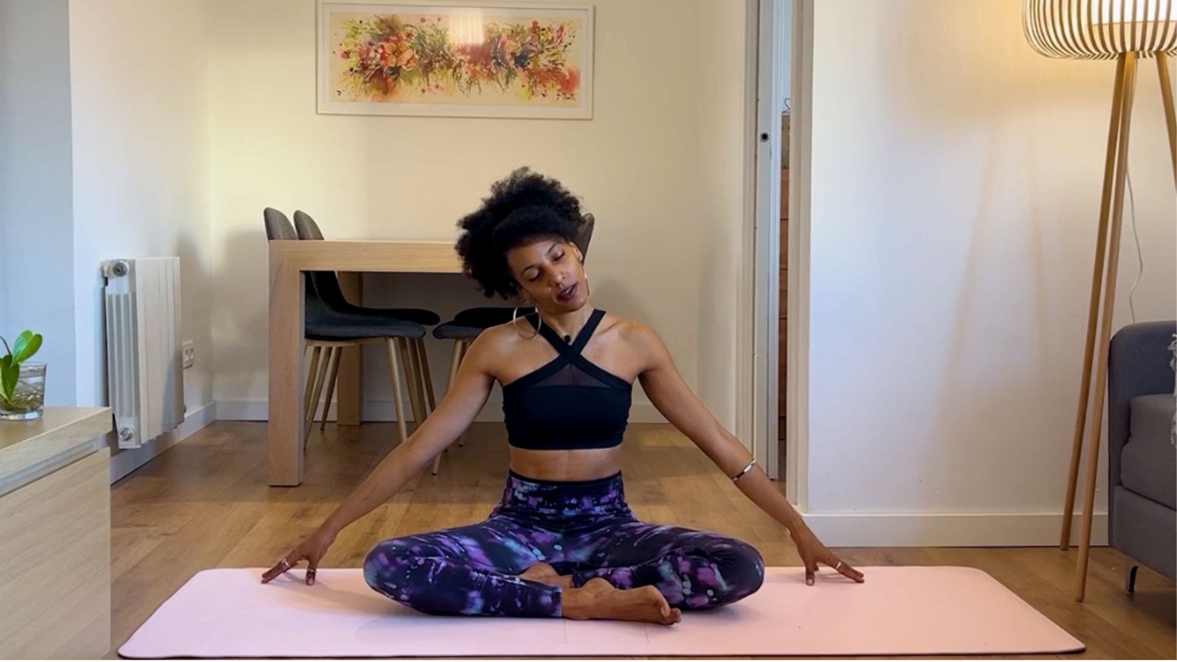 Yoga teacher practicing neck stretch.