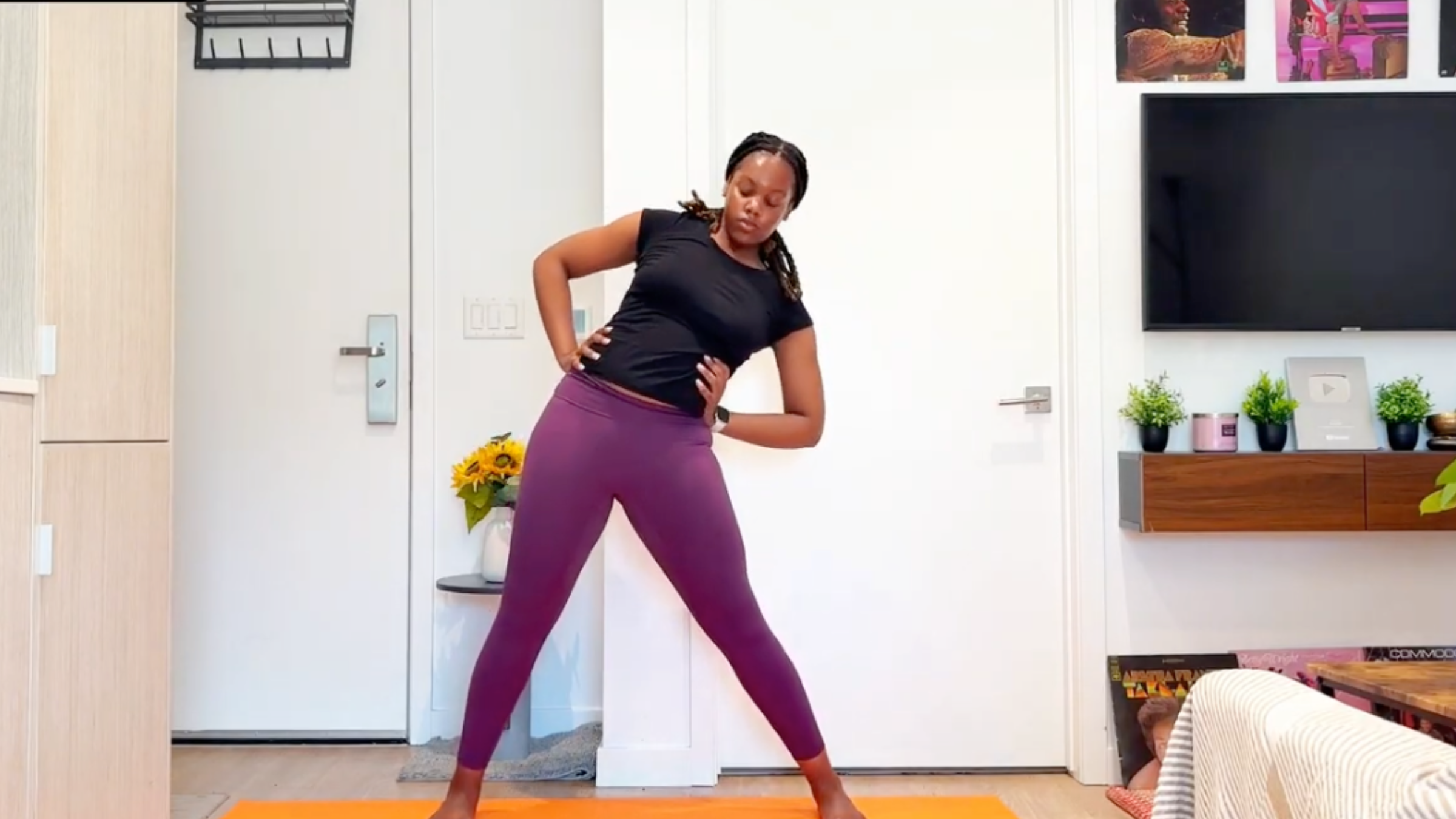 Yoga teacher practicing hip circles