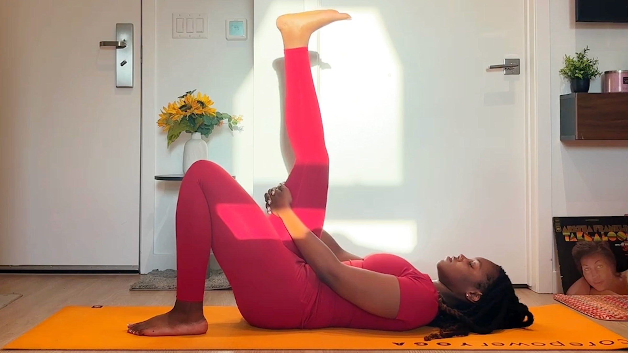 Ramoni Overton practicing hamstring stretch.