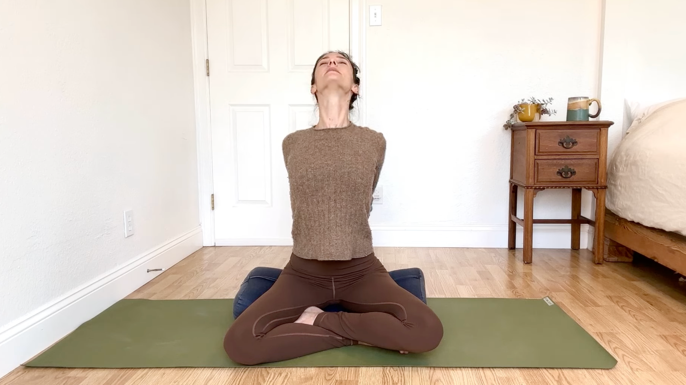 15-Minute Yoga to Ease Stress and Slow Down—Without Standing Up