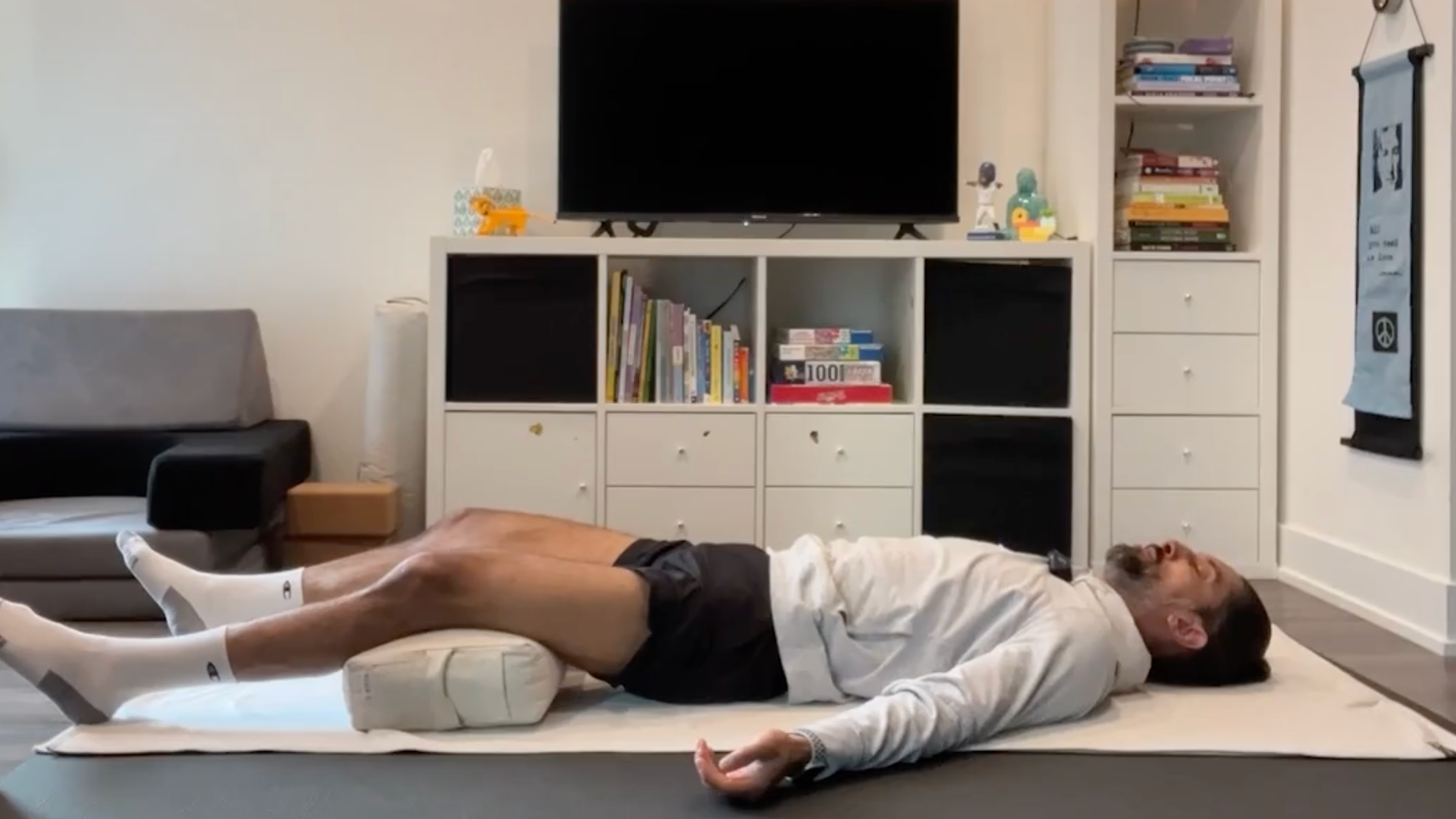 Yoga teacher Jaffer Hussain in Savasana
