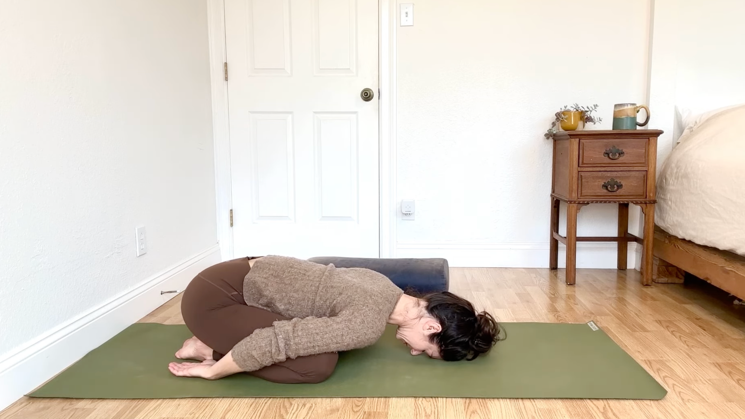 Yoga teacher Michelle Martone in Child's Pose, part of her gentle yoga practice