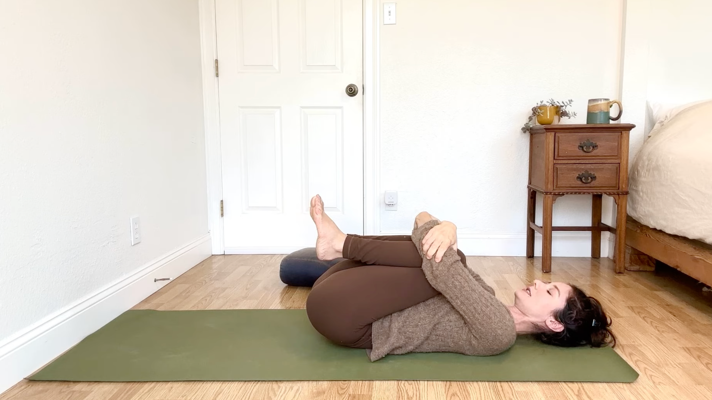 15-Minute Yoga to Ease Stress and Slow Down—Without Standing Up