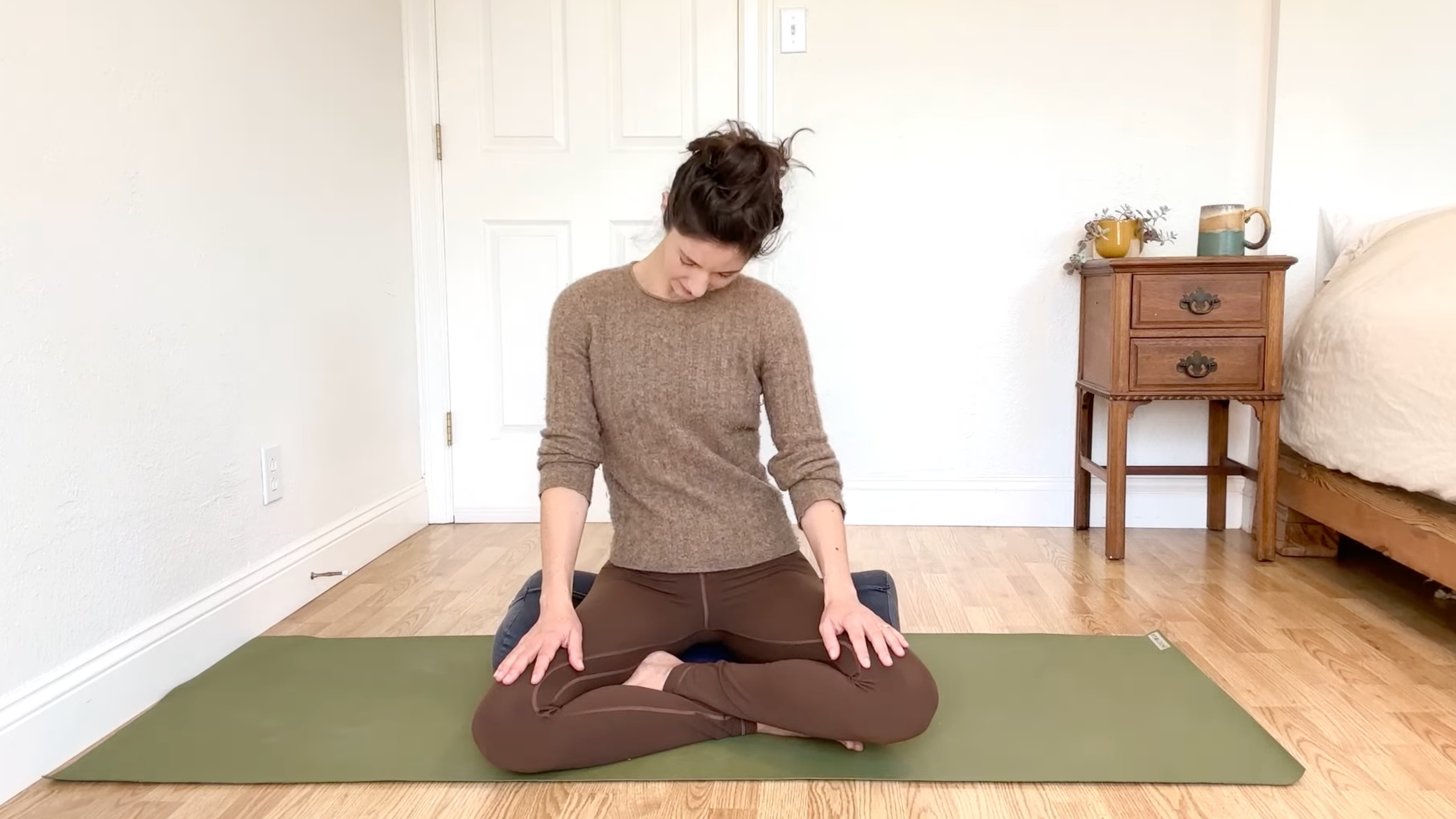 15-Minute Yoga to Ease Stress and Slow Down—Without Standing Up