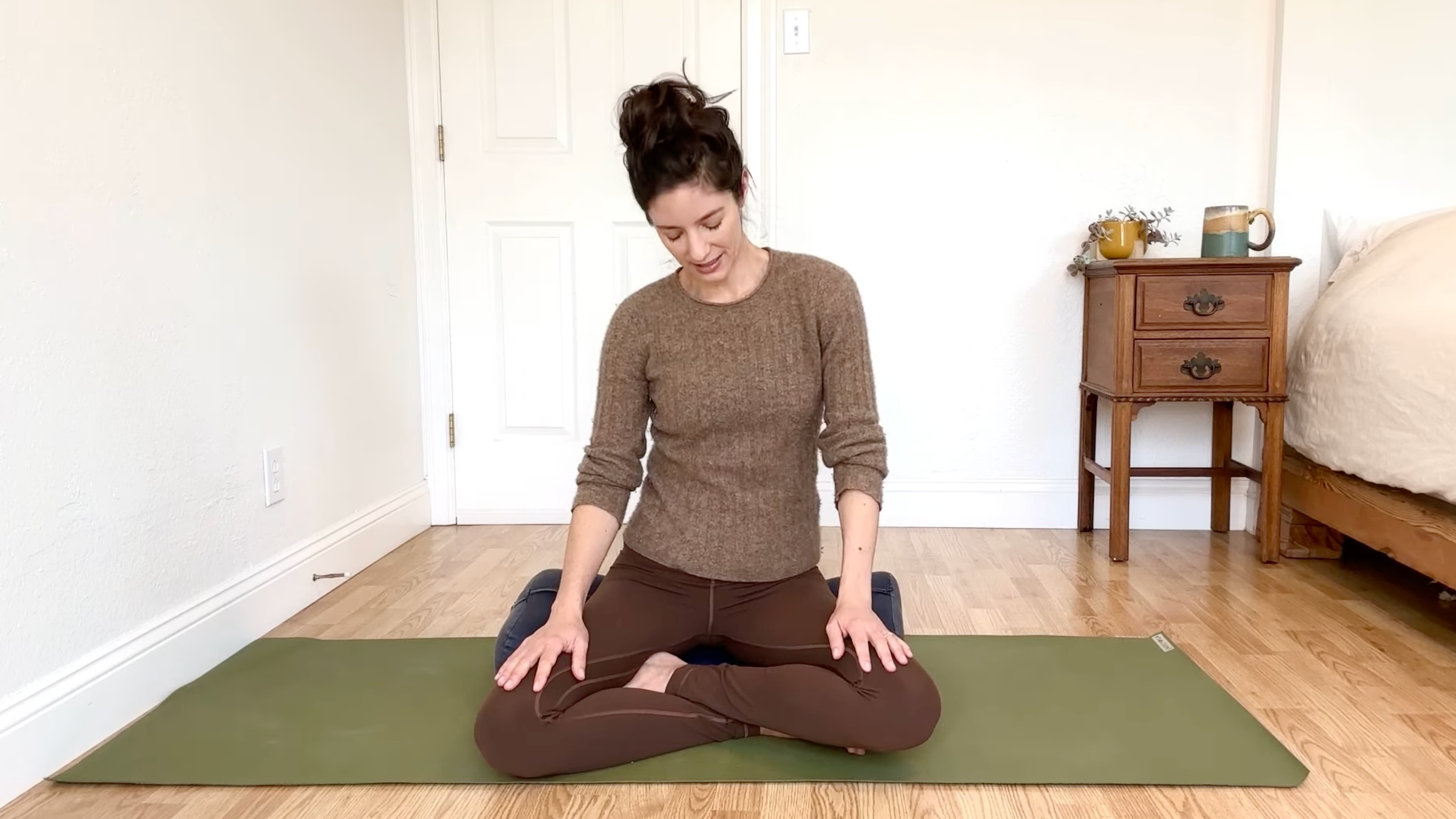 15-Minute Yoga to Ease Stress and Slow Down—Without Standing Up
