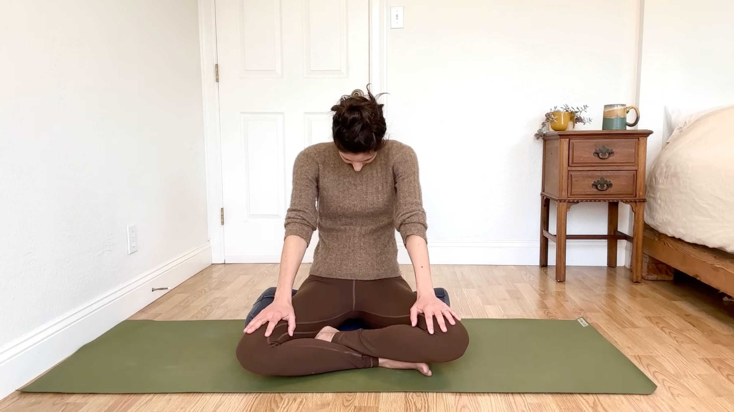 15-Minute Yoga to Ease Stress and Slow Down—Without Standing Up