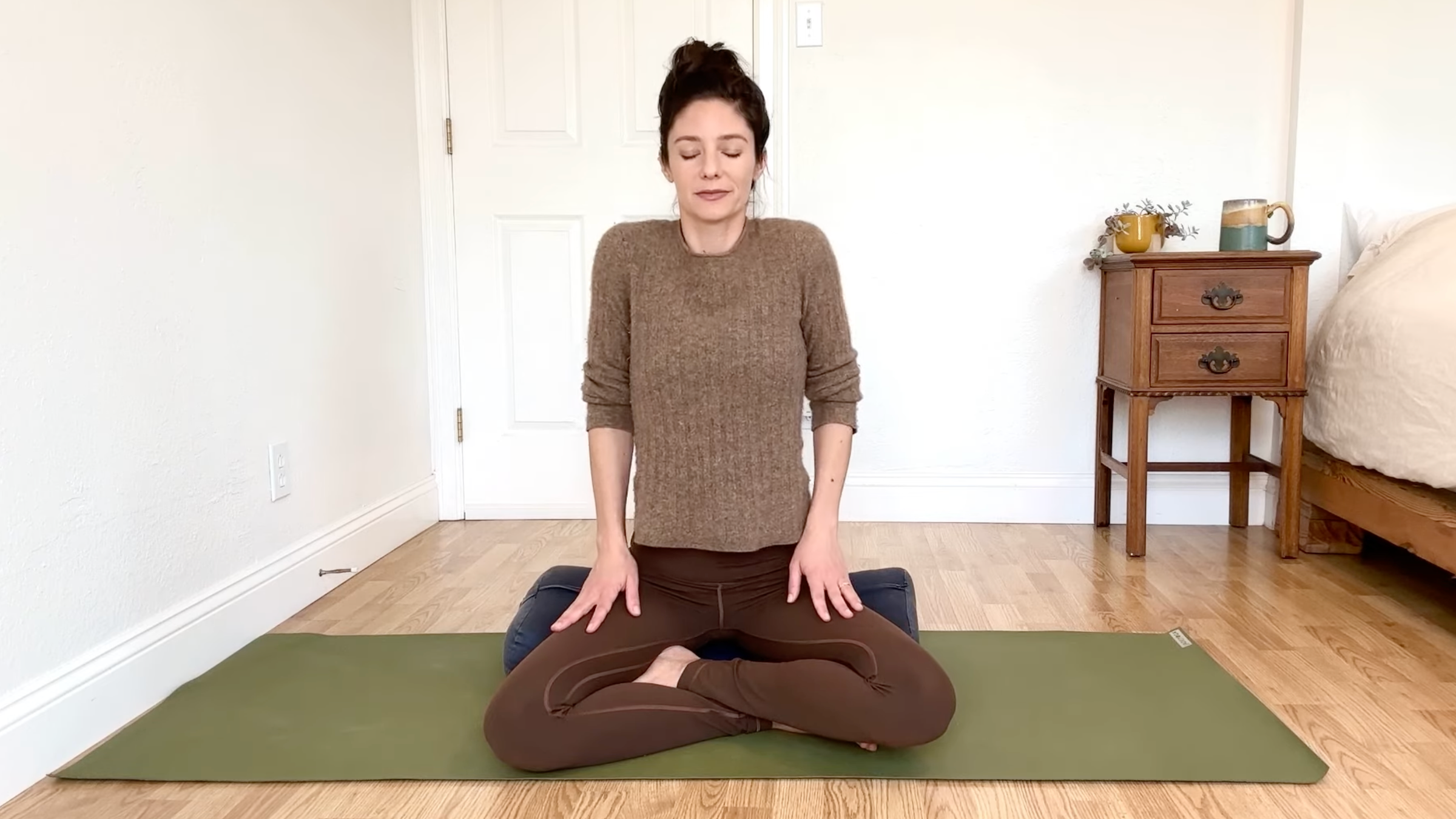15-Minute Yoga to Ease Stress and Slow Down—Without Standing Up