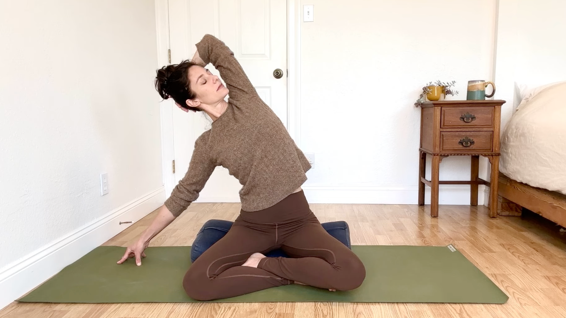15-Minute Yoga to Ease Stress and Slow Down—Without Standing Up