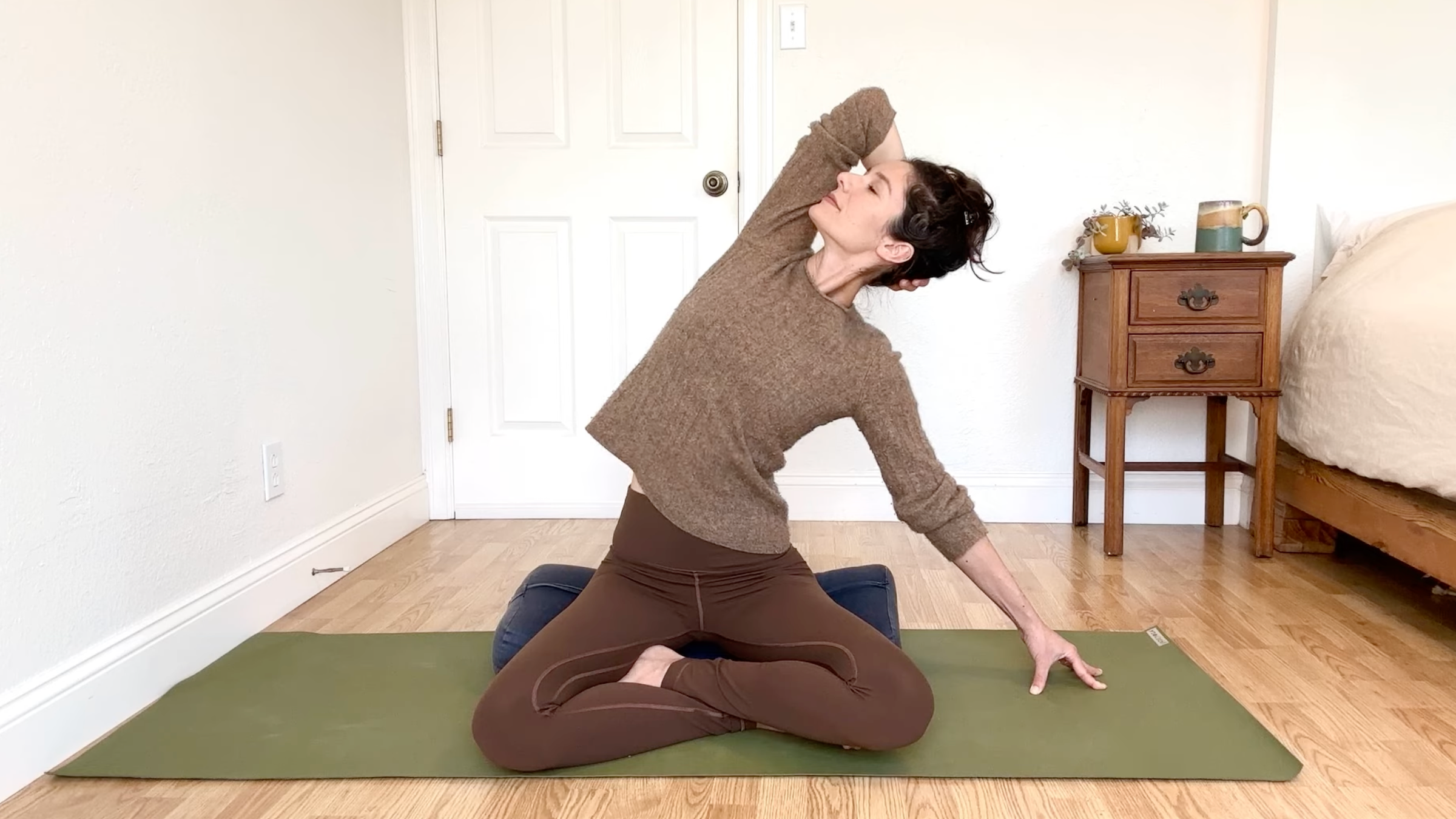 15-Minute Yoga to Ease Stress and Slow Down—Without Standing Up