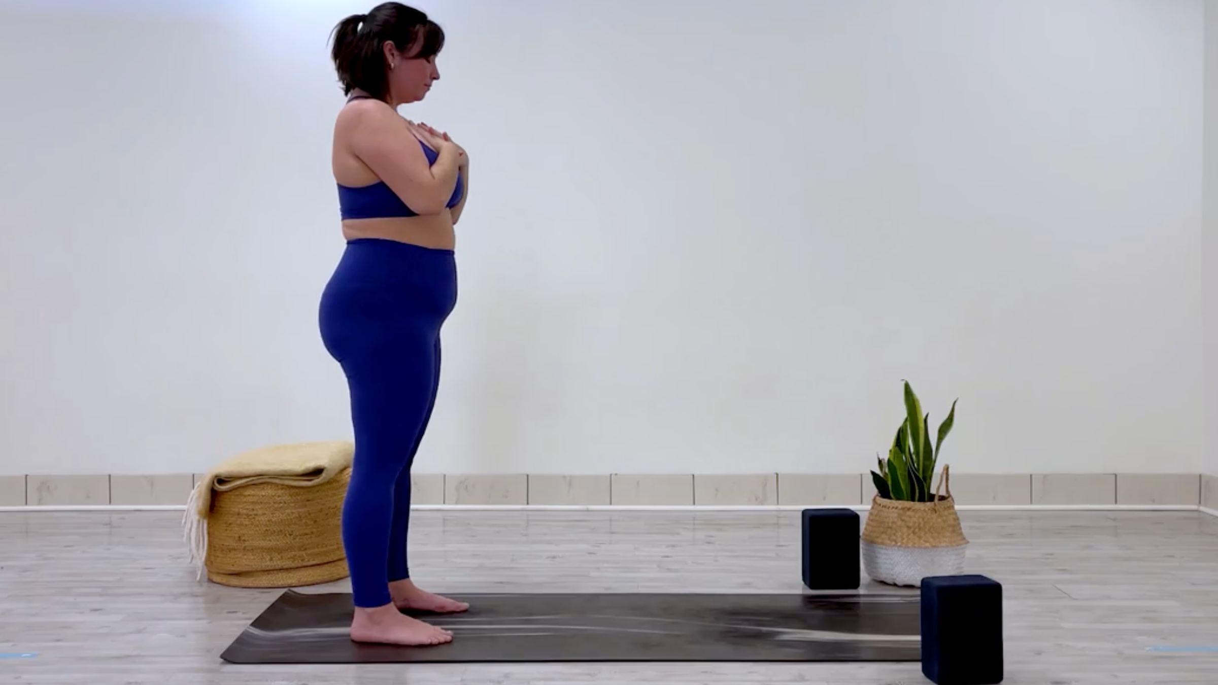 Teacher Taylor Lorenz in Mountain Pose