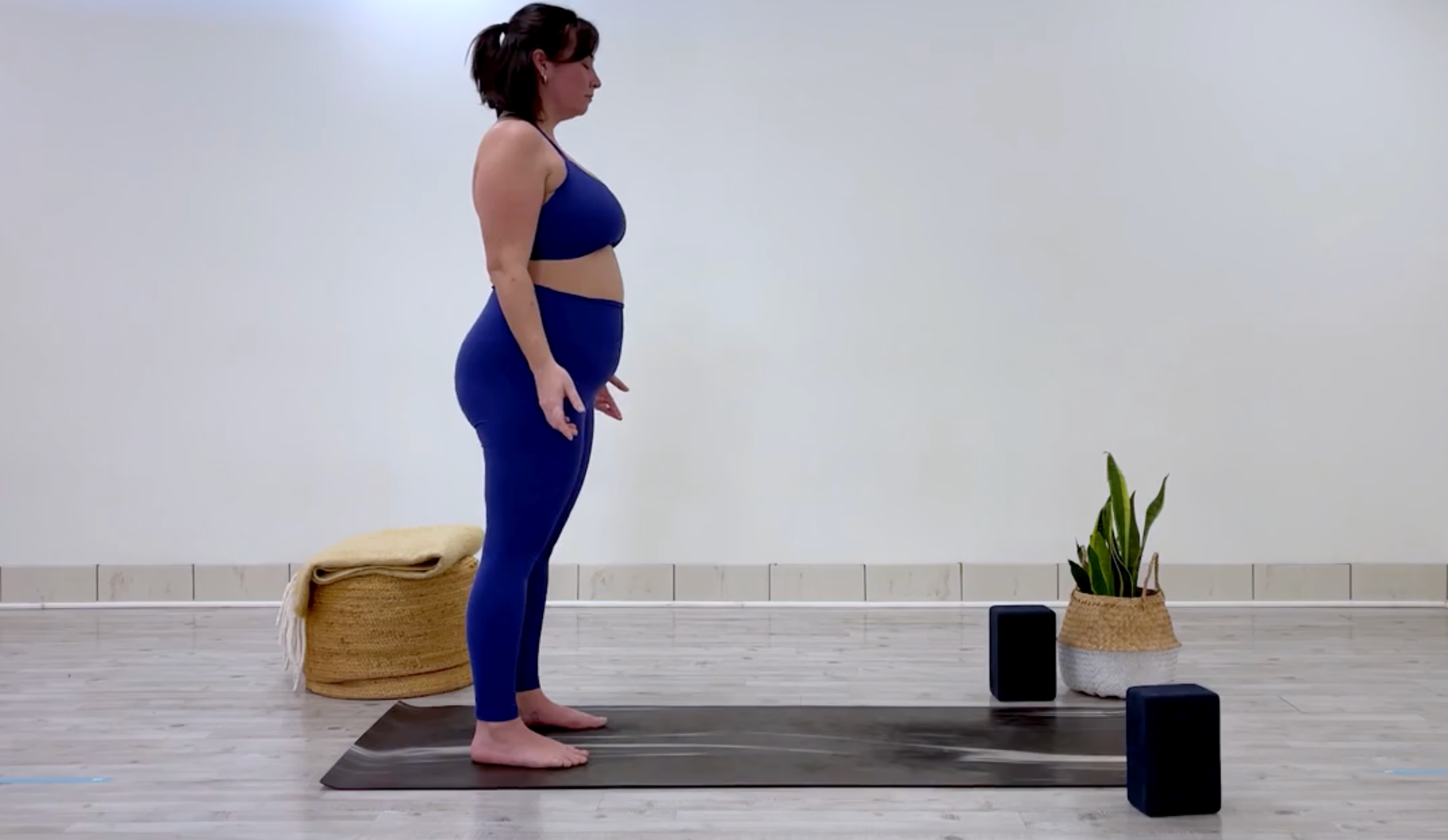 Teacher Taylor Lorenz in Mountain Pose