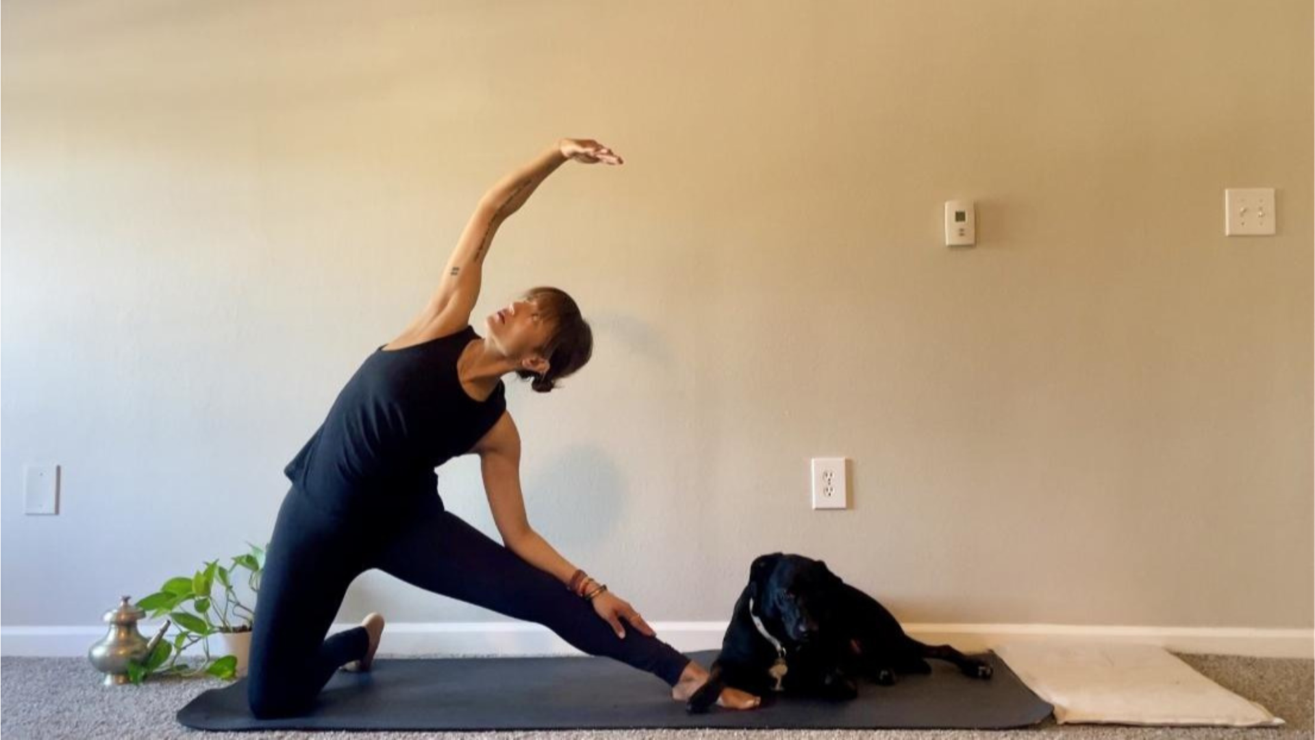 Woman kneeling on a yoga mat while practicing physical movements that help her know how to stop being a people-pleaser