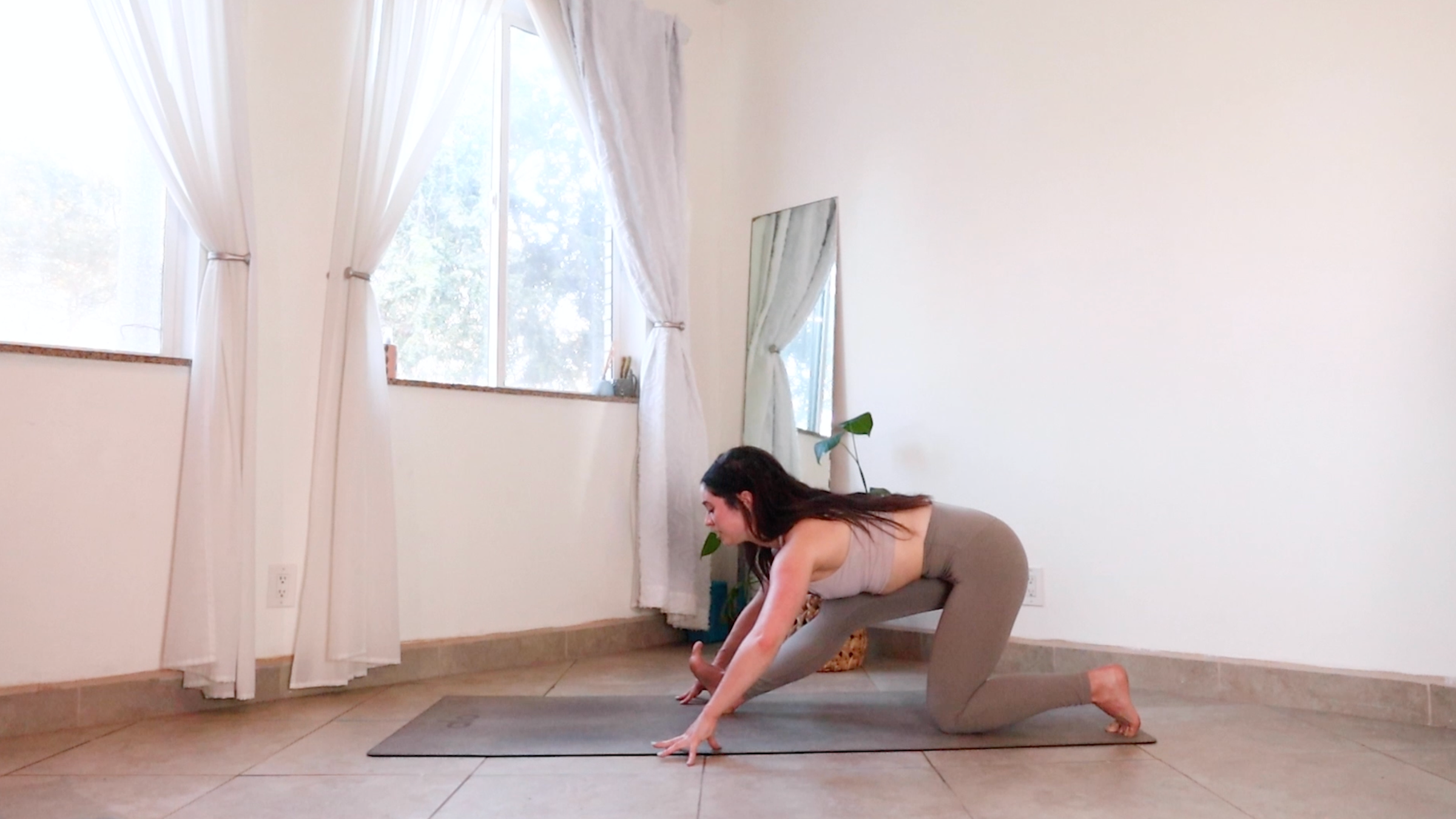 Yoga teacher Daria LeGrand in Half Splits, part of her morning yoga practice