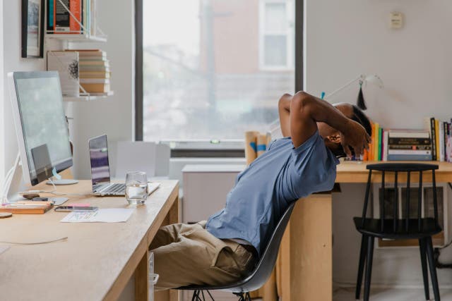 These Yoga Desk Stretches Are So Discrete, You Can Do Them During a Zoom Meeting