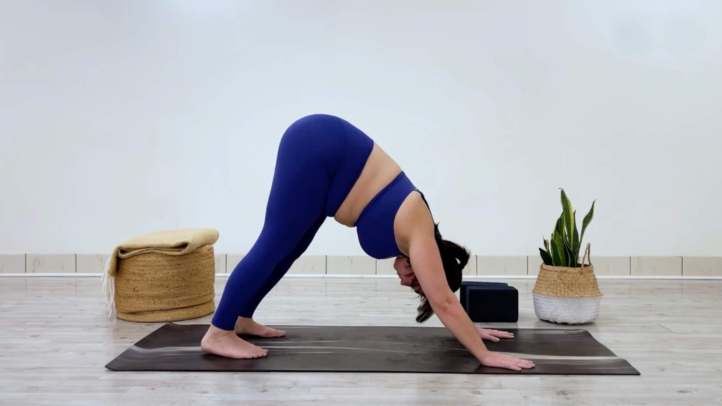 Teacher Taylor Lorenz in Downward-Facing Dog