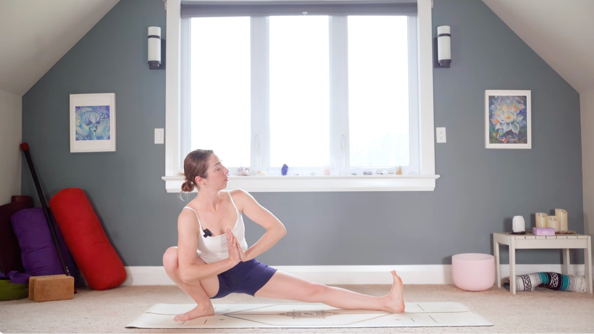 Woman practicing Skandasana or Side Lunge during a 15-minute morning yoga routine