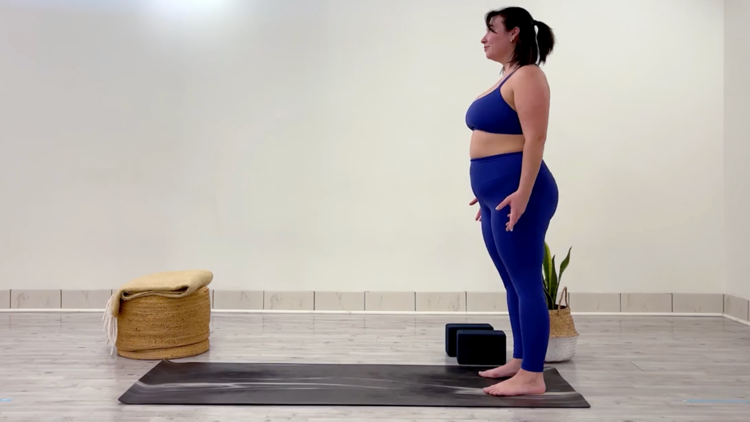 Teacher Taylor Lorenz in Mountain Pose