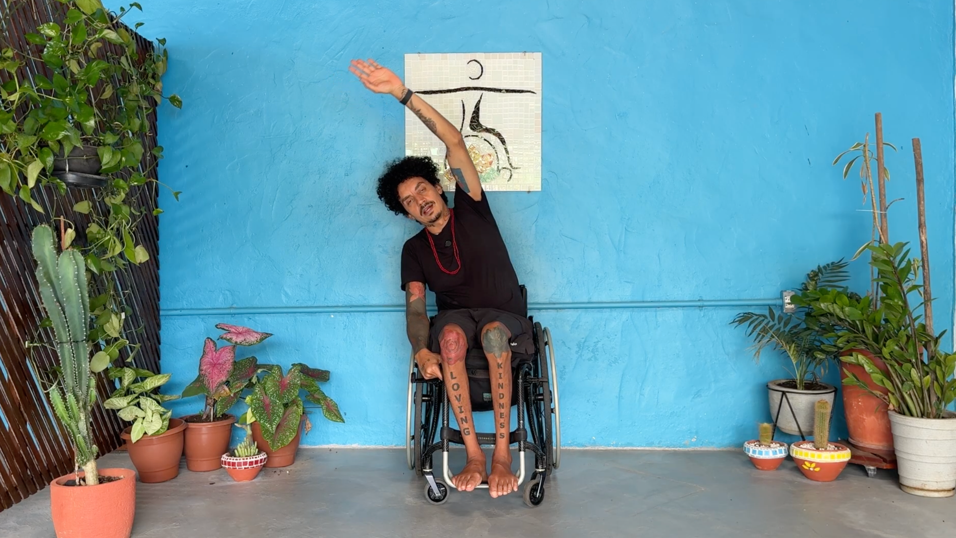 Man sitting and practicing side stretches