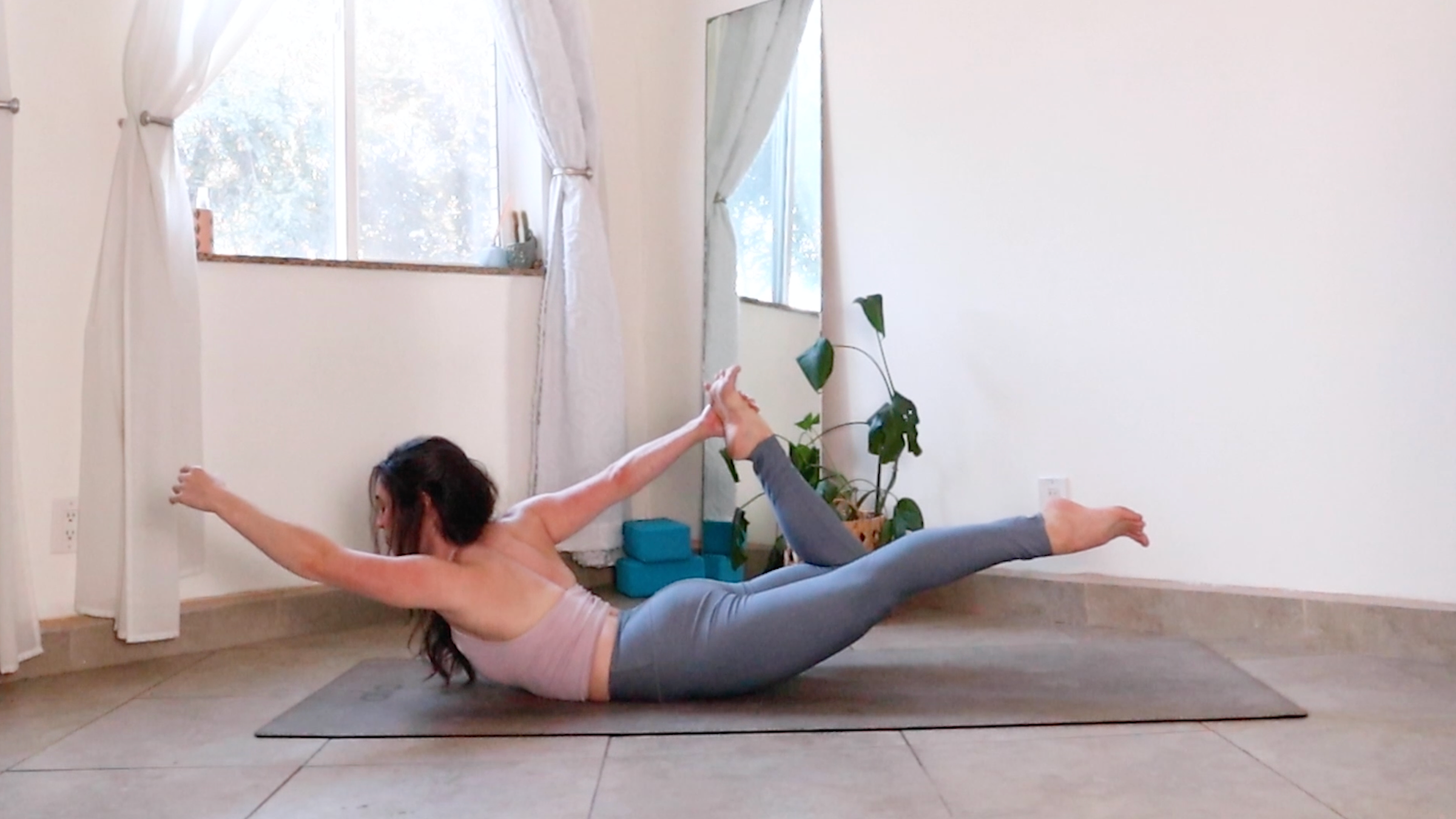 Teacher Daria LeGrand in Bow Pose Variation