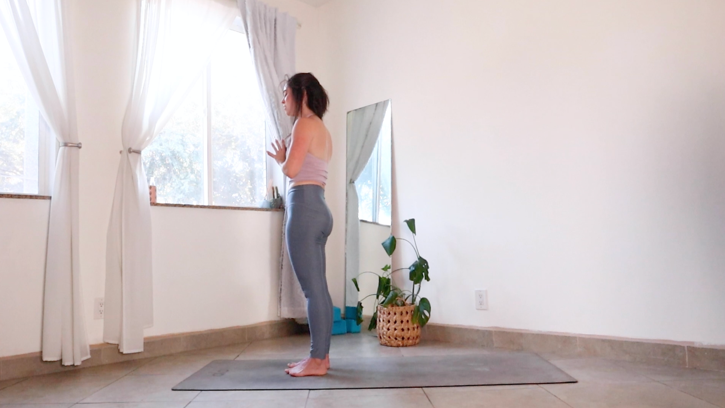 Teacher Daria LeGrand in Mountain Pose, part of her morning yoga routine