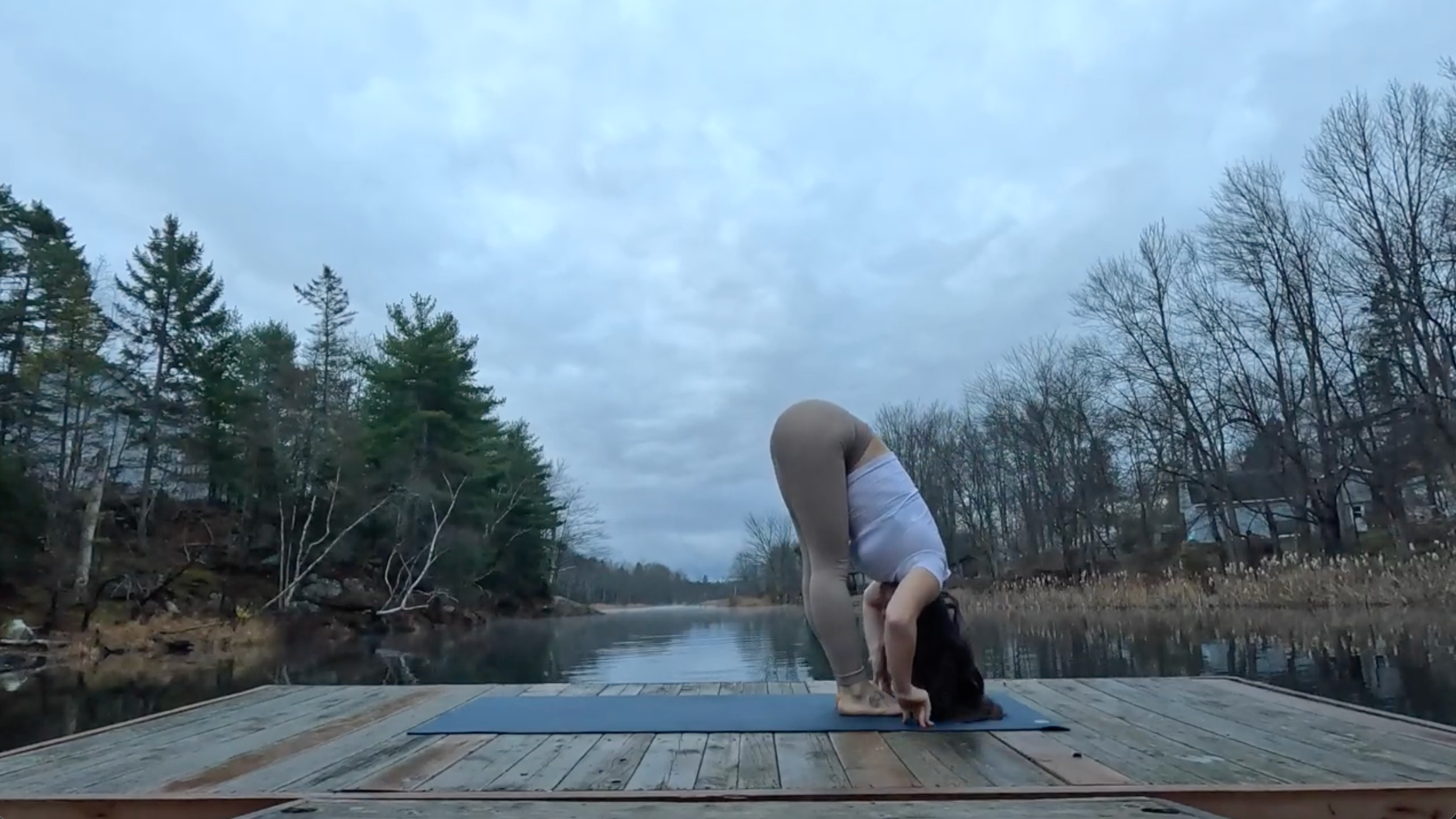 Teacher Emily Baltzer in Standing Forward Bend