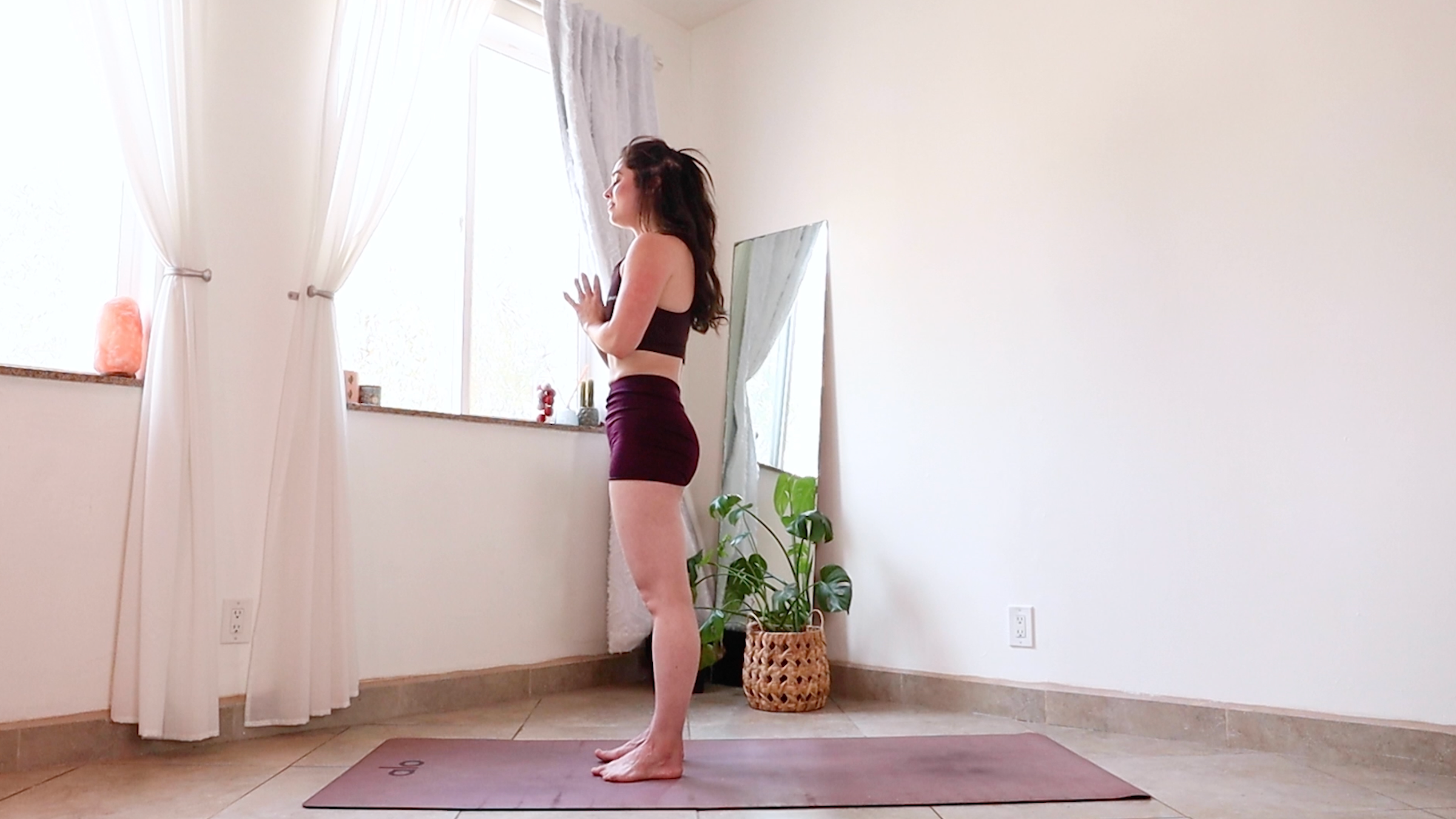 Yoga teacher Daria Legrand in Mountain Pose, part of her yoga practice to reset the mind and body