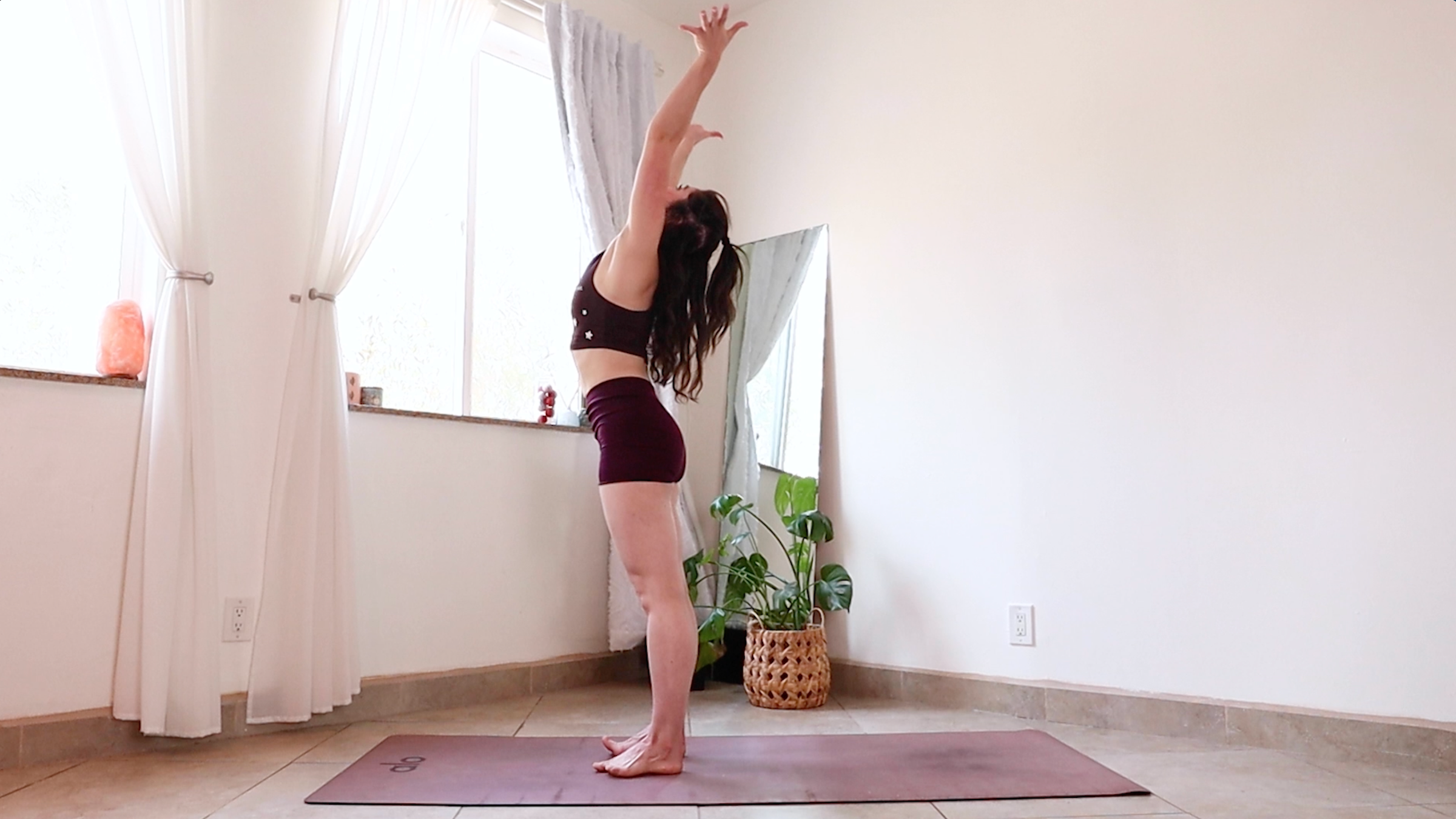 Yoga teacher Daria LeGrand in high-five