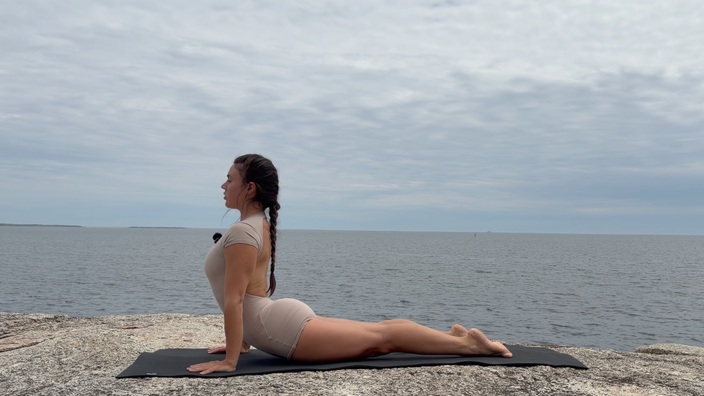 Teacher Emily Baltzer in Cobra Pose