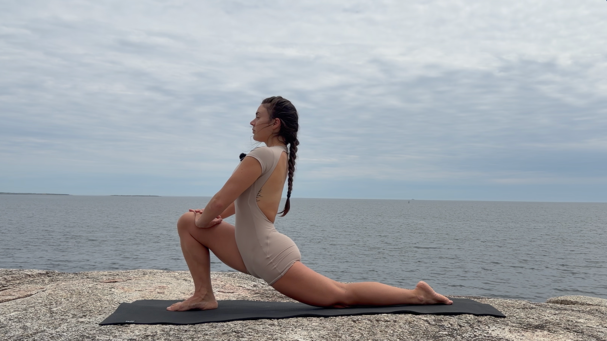 Teacher Emily Baltzer in Low Lunge, part of her daily yoga stretching routine