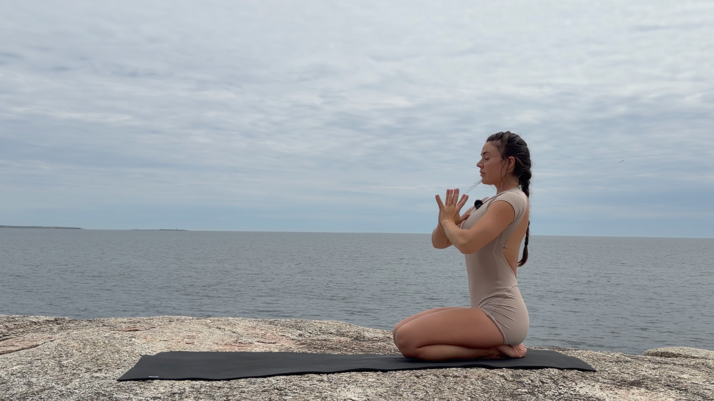 Teacher Emily Baltzer in Thunderbolt Pose, part of her daily yoga stretching routine