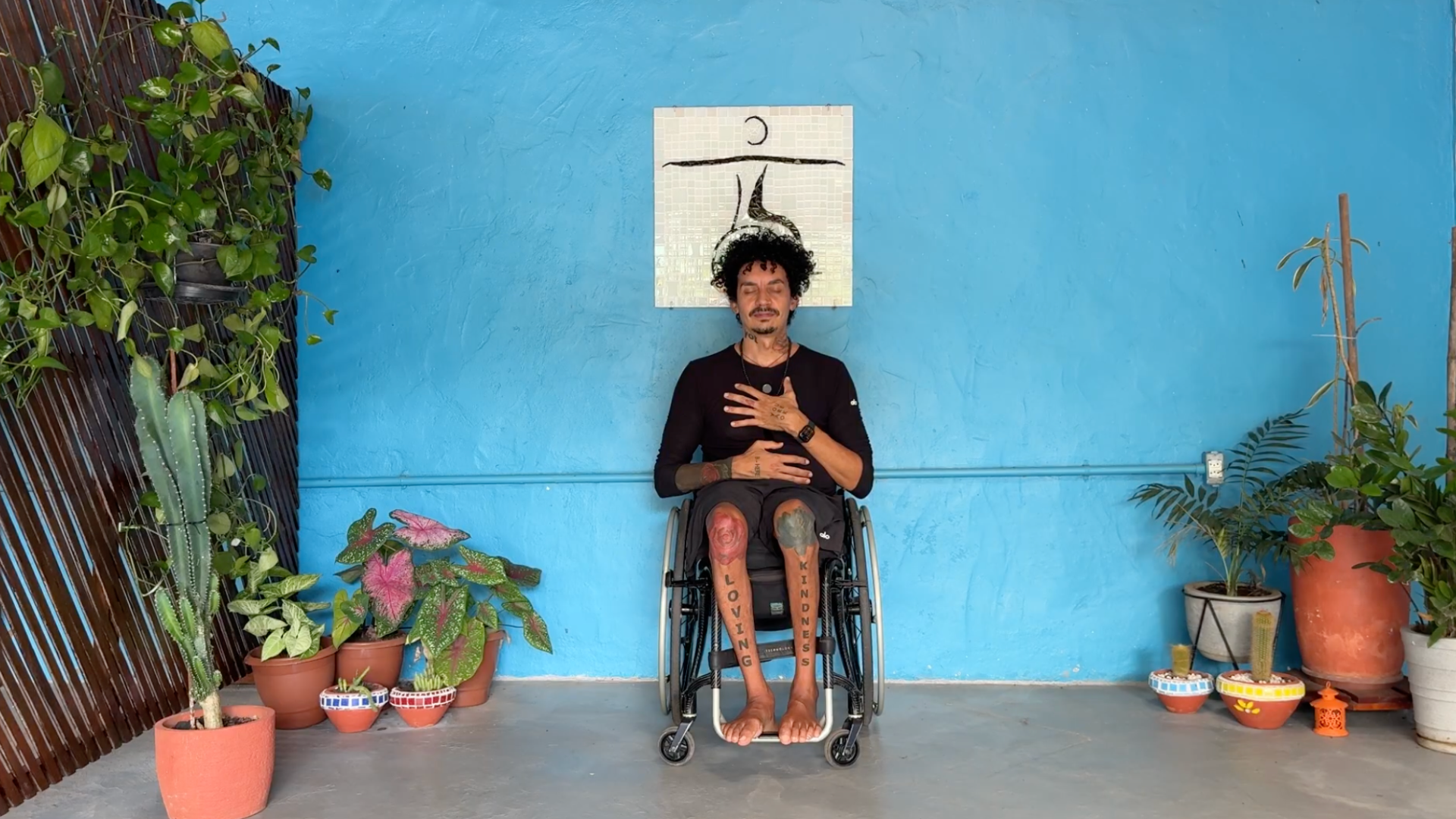 Yoga teacher leading a chair yoga for self love routine