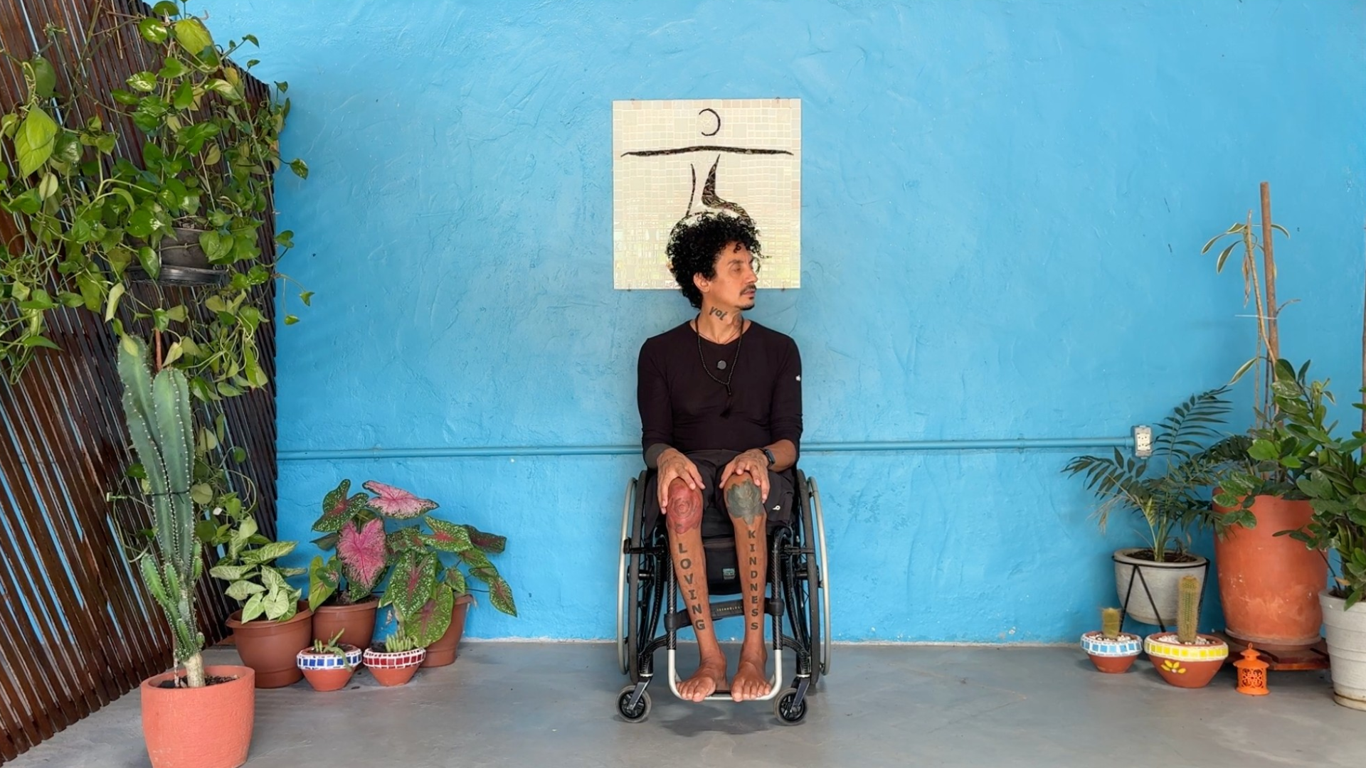 Man sitting in a chair doing neck rolls