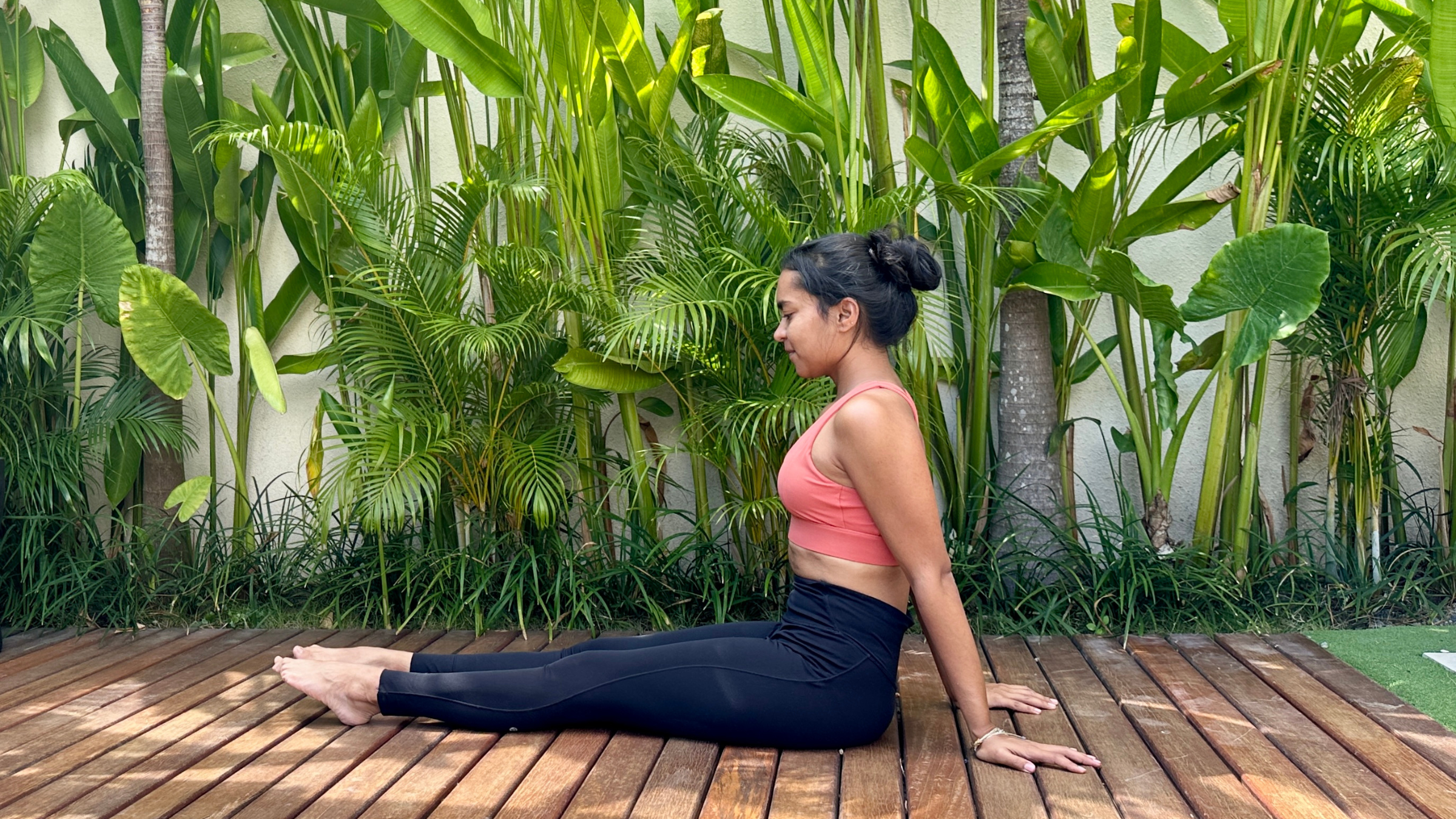 Yoga instructor rolling ankles.