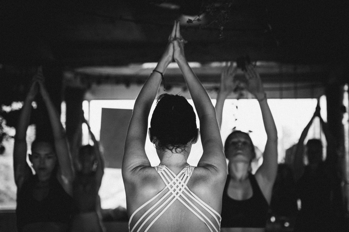 Yoga Teachers, Here's How to Support Students With Injuries Without Giving Medical Advice