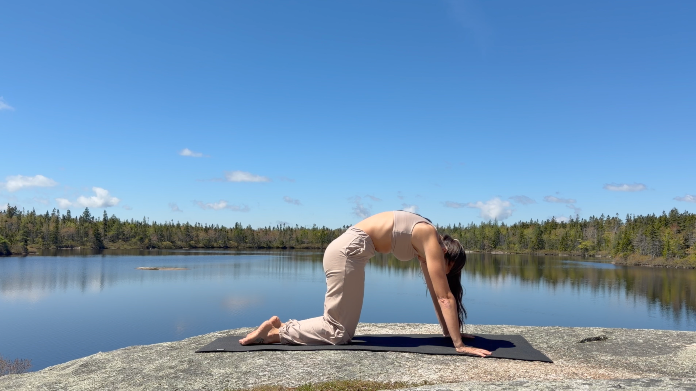 Yoga teacher Emily Baltzer in Cat Pose