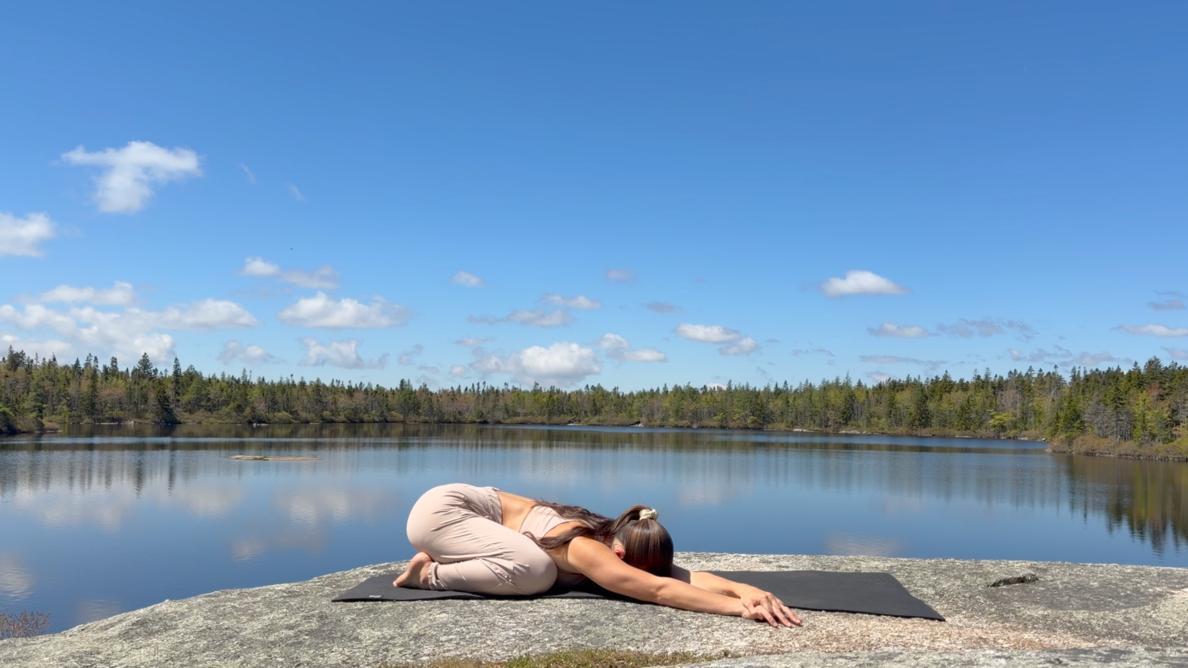 How to boost energy: yoga teacher Emily Baltzer in Child's Pose