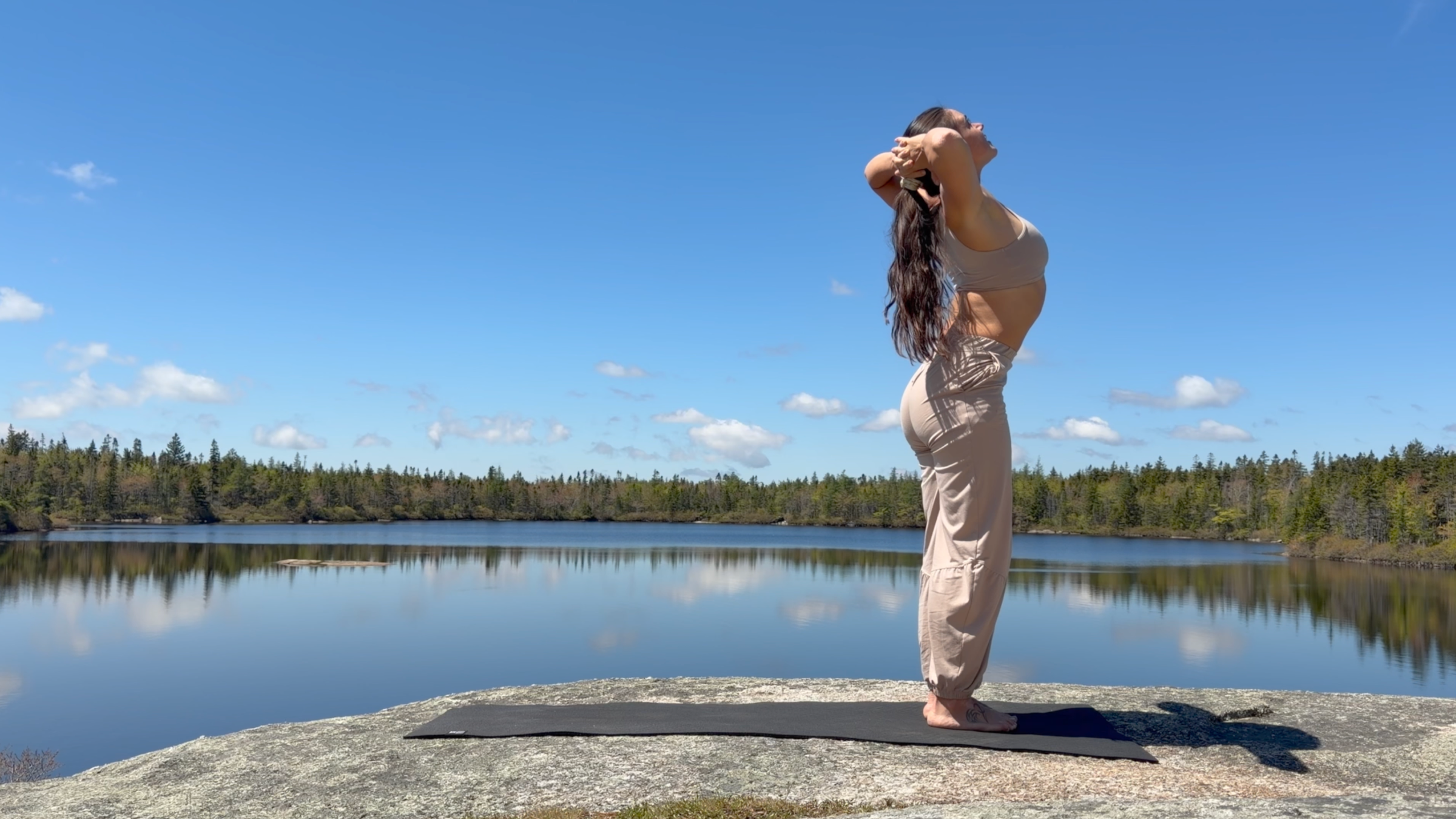 Yoga teacher Emily Baltzer doing Spine Circles