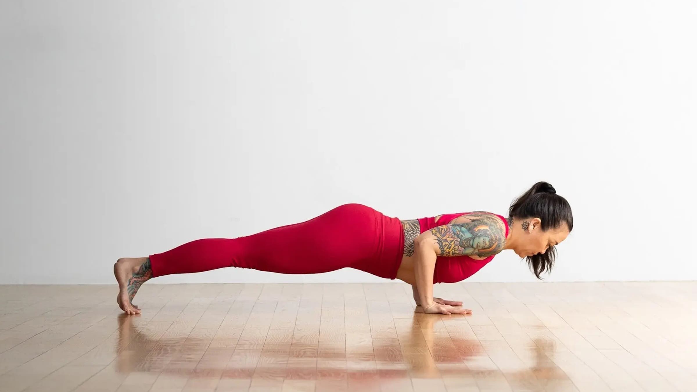 A woman in Chaturanga