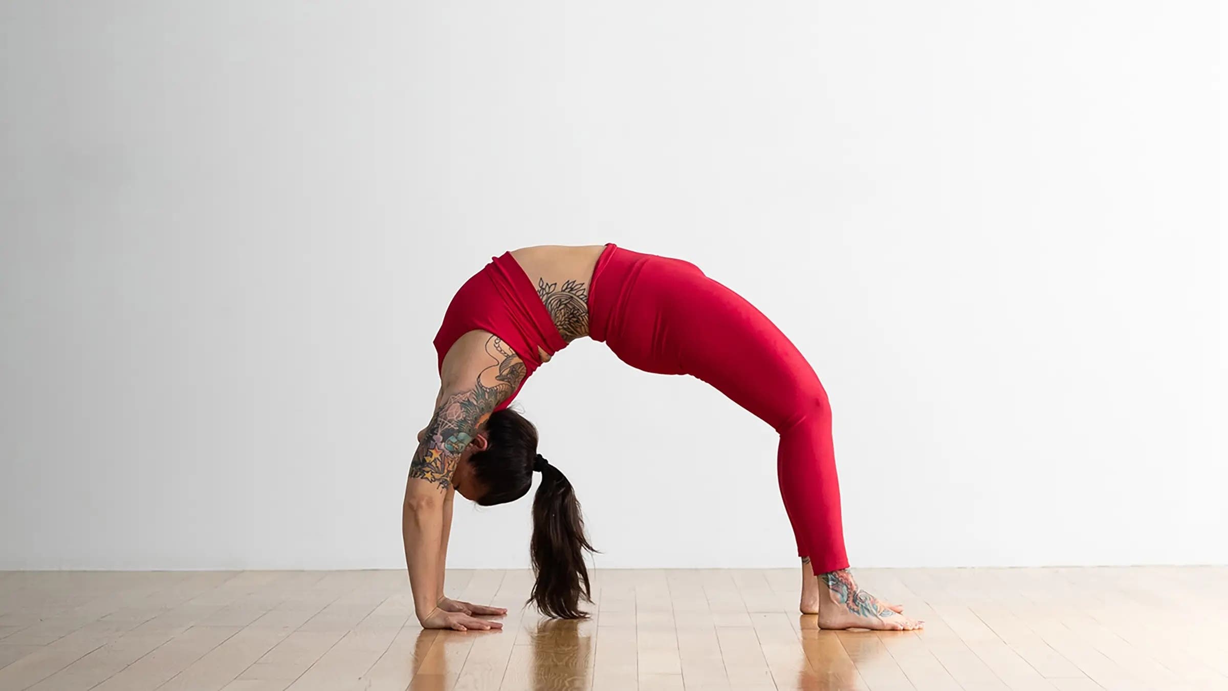 A woman in Wheel Pose