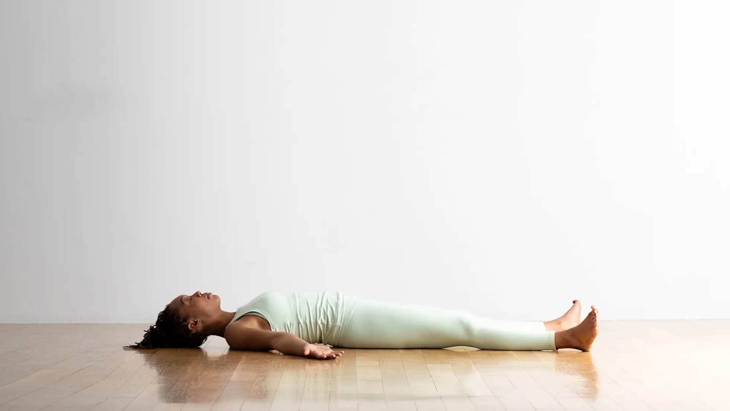 A person in Savasana