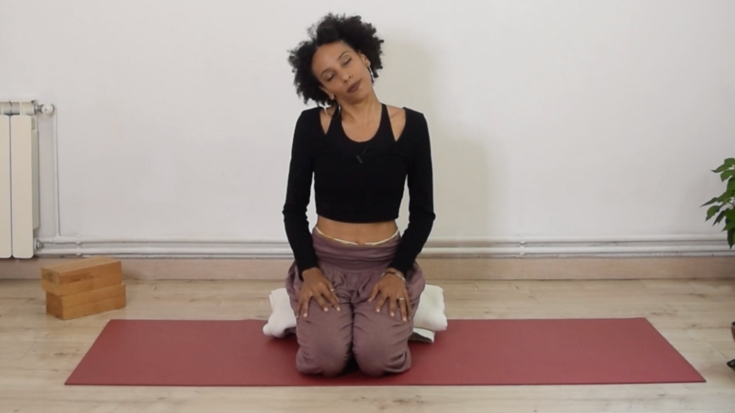 Feeling Stiff and Stuck? This 11-Minute Yoga Break Can Help You Unclench.