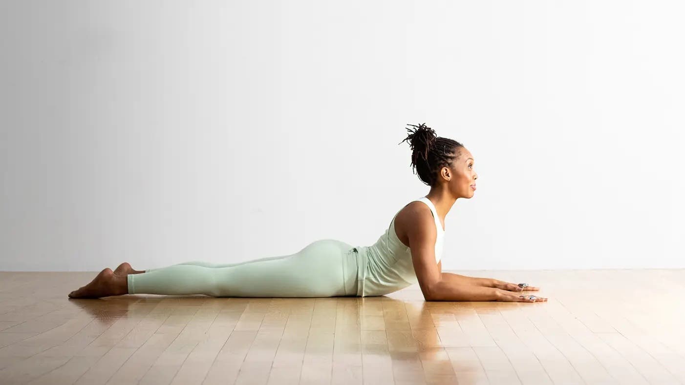 A woman in Sphinx Pose, one of our suggestions for how to deal with anxiety