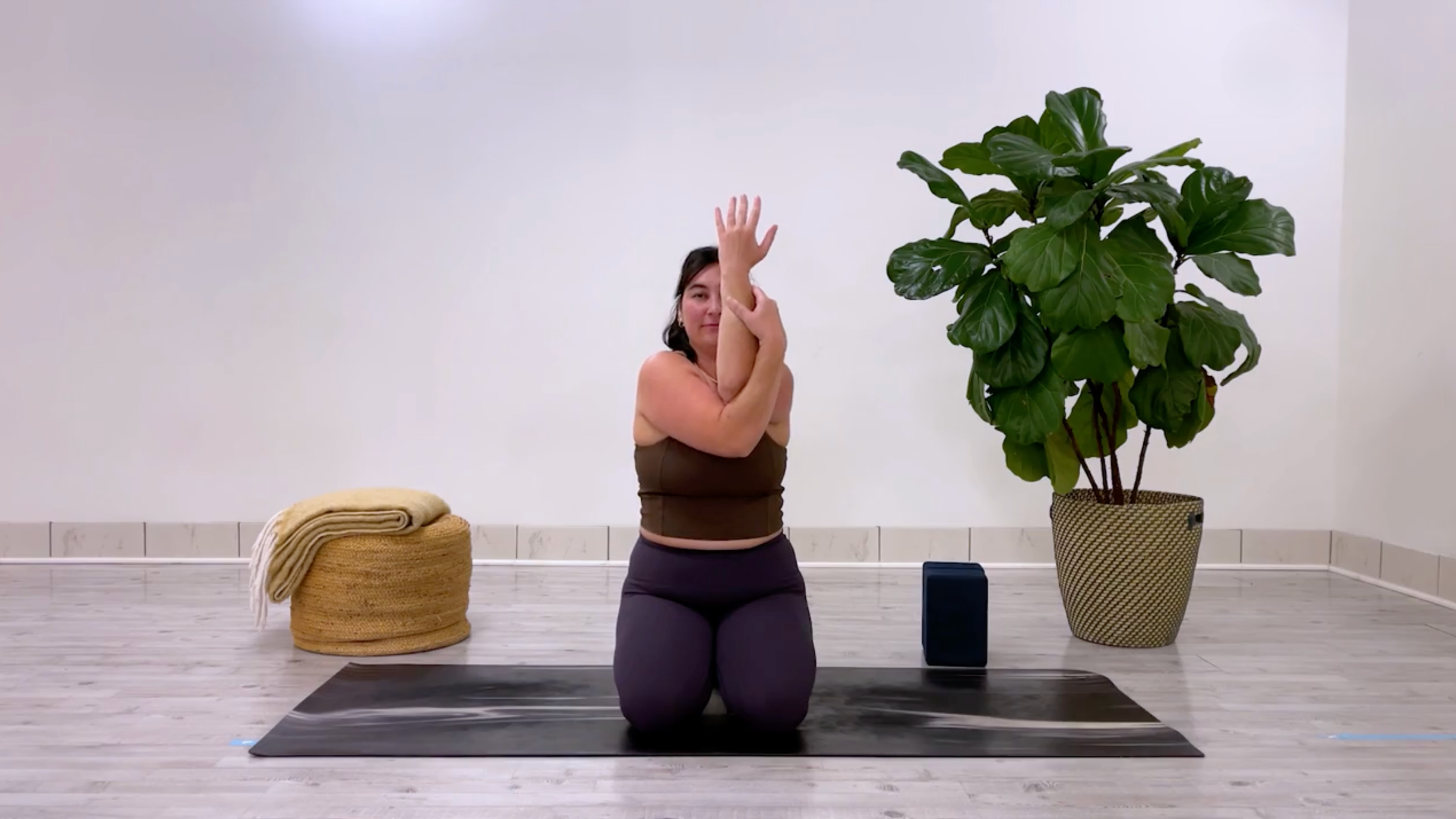 Yoga for better posture: teacher Taylor Lorenz in Eagle Arms