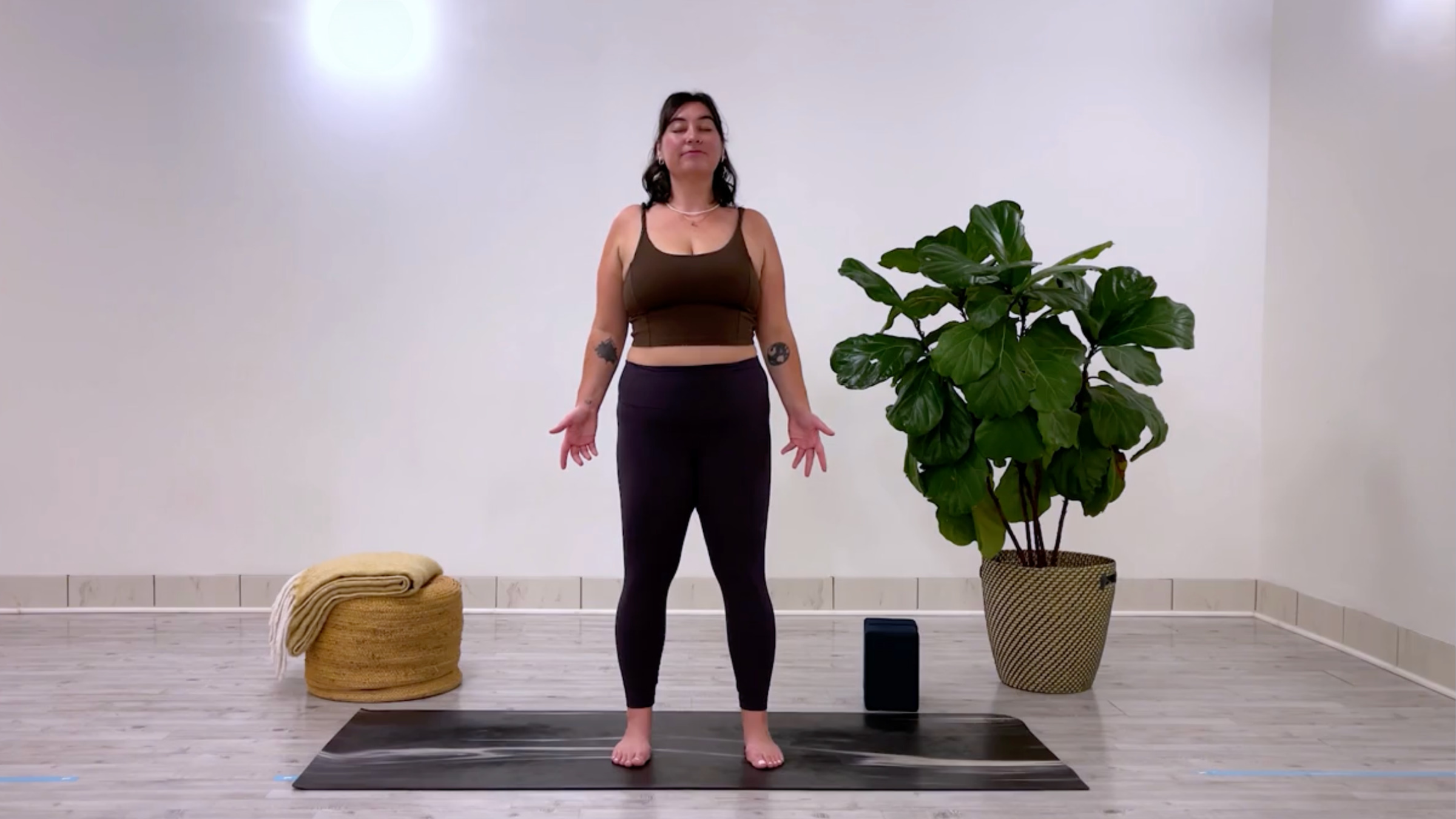 Yoga for better posture: teacher Taylor Lorenz in Mountain Pose, or Tadasana in Sanskrit