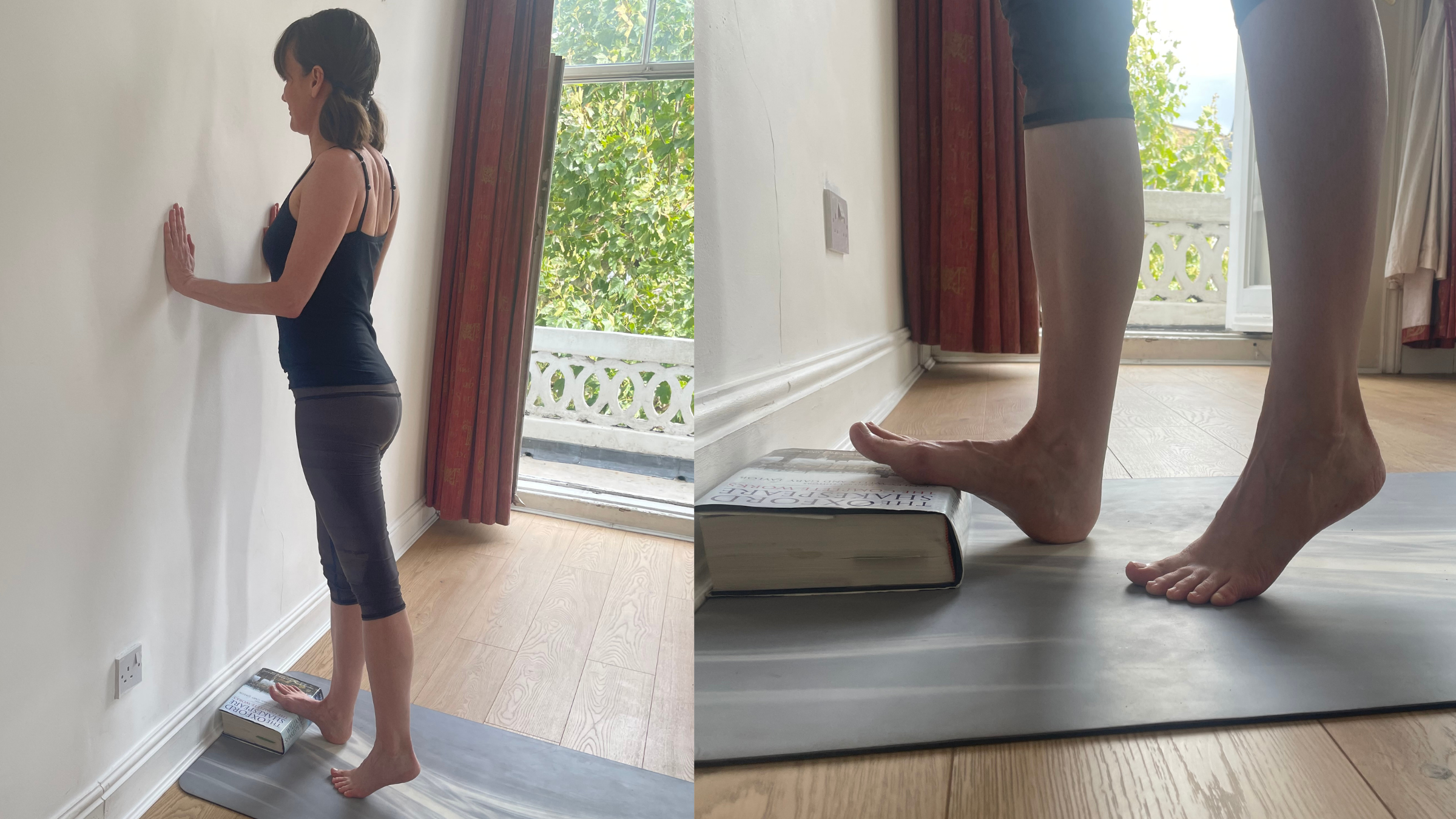 Amber Burke standing facing a wall, with the ball of her right foot elevated on a yoga block and her right heel dropping toward the floor, leaning forward with bent arms resting against the wall.