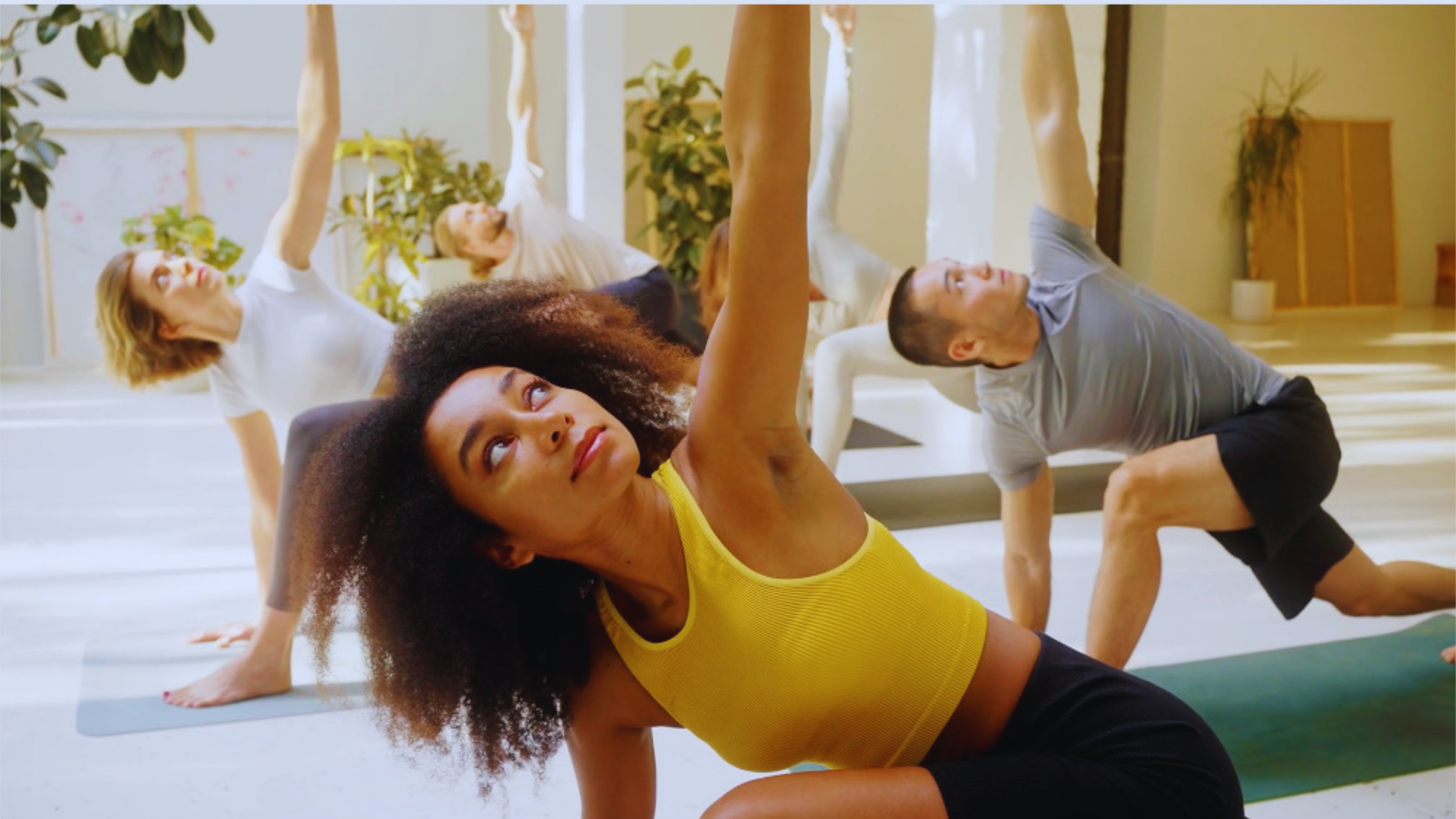 Yoga teacher leading class