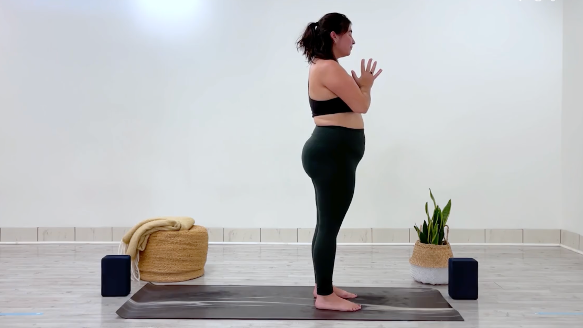 Yoga teacher Taylor Lorenz in Mountain Pose, Tadasana in Sanskrit, part of her yoga for balance practice
